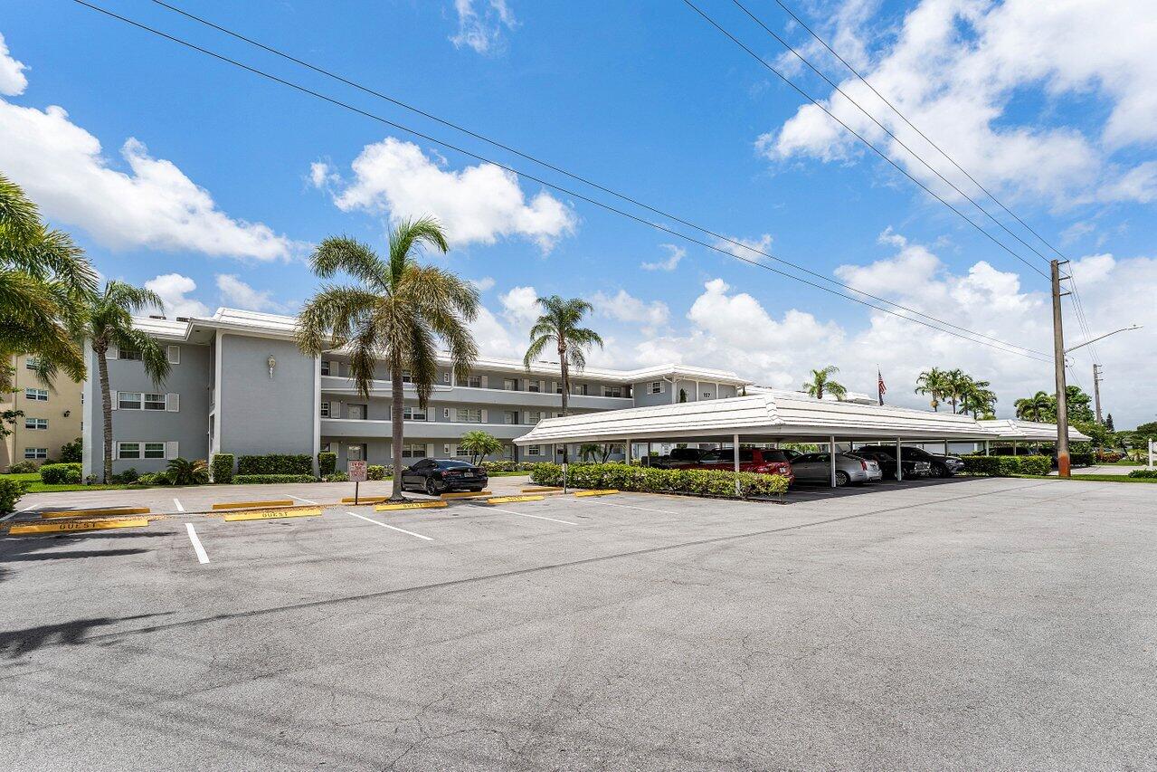 Top floor corner unit with panoramic views of the golf course and water. 1421 sq of living space in the beautiful city of Atlantis. New AC, WH, Electric panel and washer and dryer. Come put your finishing touches on this desirable condo!