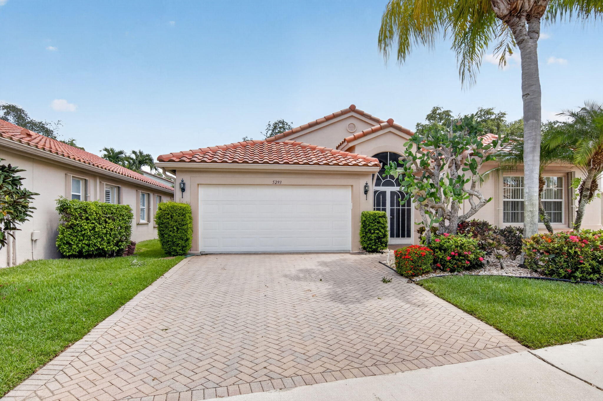 Desirable Balmoral model without the wall creating an open great room with vaulted ceilings, tile in common areas & vinyl flooring in bedrooms. Spacious kitchen with 42 inch cabinets, granite counter tops  & updated appliances. The home is set a private lot with lovely garden views.  The primary suite has 2 walk in closets, dual sinks, separate roman tub & walk in shower. The exterior of the home was newly painted and the roof was replaced in 2020 - there are accordion hurricane shutters throughout. Cascade Lakes is a gated active adult community in the heart of Boynton Beach featuring indoor/outdoor pool, pickle ball & tennis courts with on site pros, fitness center, bocce ball courts and much more! The clubhouse is under renovation with no cost to the buyers! Come enjoy the FL lifestyle!