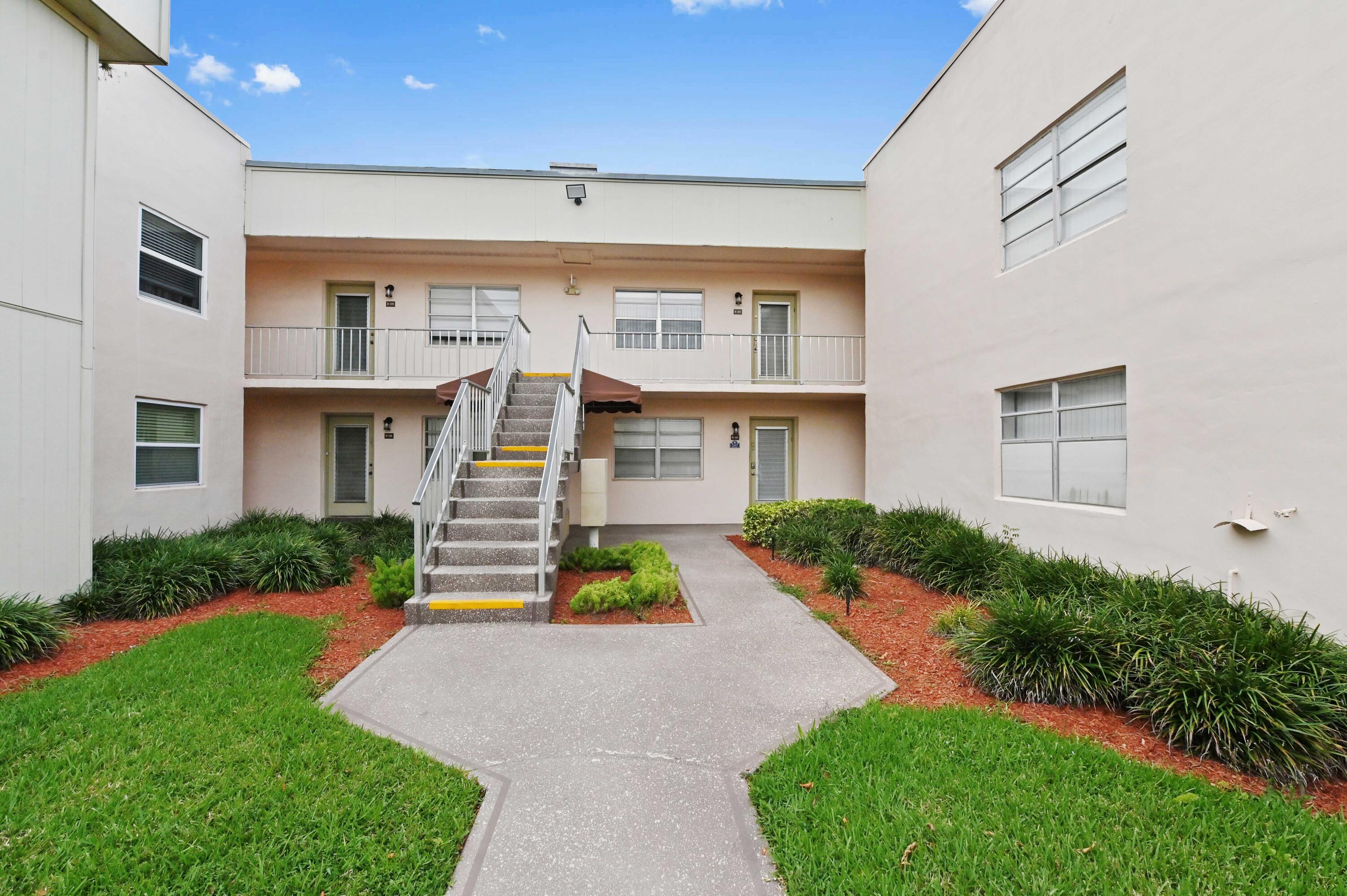Handyman/Investor special with tons of potential featuring a serene lake view, located in the desirable Kings Point Golf & Country Club—an exclusive, 55+ community designed for comfortable and active living. Ideally situated just 6 miles from the ocean and vibrant, historic downtown Delray Beach. The kitchen opens to a comfortable living and dining area, creating a bright and functional layout perfect for everyday living or entertaining. Large windows and the corner location enhance the sense of space while capturing peaceful water views.  Additional highlights include an in-unit washer and dryer for added convenience. Located just 6 miles from the beach and the shops, dining, and culture of historic downtown Delray Beach, this home offers both relaxation and accessibility.  Enjoy all that Kings Point has to offer—golf, pools, clubhouse amenities, and an active lifestyle designed for its residents.