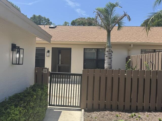 Welcome to this beautifully maintained one-story condominium in the desirable Pine Ridge at Martin Downs community in Palm City. Offering 2 bedrooms, 2 full bathrooms, and 1,145 square feet of thoughtfully designed living space, this home combines comfort, functionality, and low-maintenance living.  Recent updates include a new A/C, refrigerator, and dishwasher, while impact glass and shutters throughout provide added peace of mind and storm protection. Enjoy abundant outdoor living with both front and rear patios, perfect for relaxing or entertaining. A one-car garage offers convenient parking and additional storage.  The HOA takes care of exterior maintenance and insurance, allowing for worry-free ownership.  Recent community improvements include new roofs, skylights, gutters, exterior lighting, and freshly painted buildings, enhancing both the appearance and long-term value of the neighborhood.  Conveniently located in the heart of Palm City, this move-in-ready home is easy to show and is expected to attract strong interest. Schedule your private showing today!