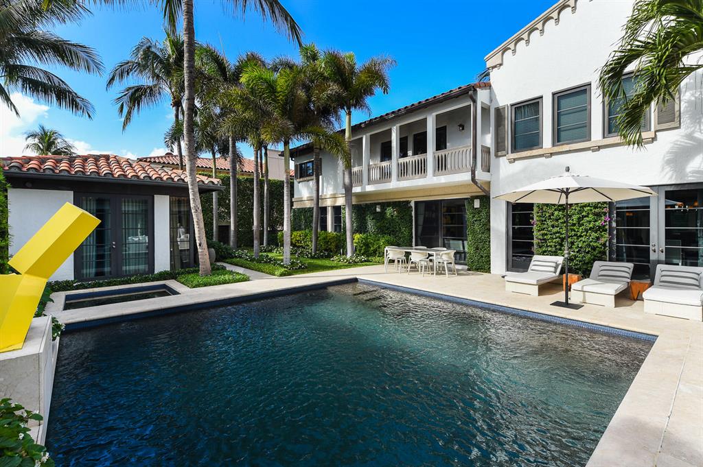 Spectacular In-Town 4BR/4.1BA home just one house from the ocean with oceanfront parcel and private beach deck. Welcoming entry foyer with soaring ceiling leads to formal living room with fireplace. Gourmet eat-in kitchen with top-of-the-line appliances, breakfast nook, and walk-in pantry. Highlights include library, formal dining room, 2 car garage, full house generator, and poolside cabana. Gorgeous outdoor spaces include pool with spa, fountains, and beautifully landscaped grounds.