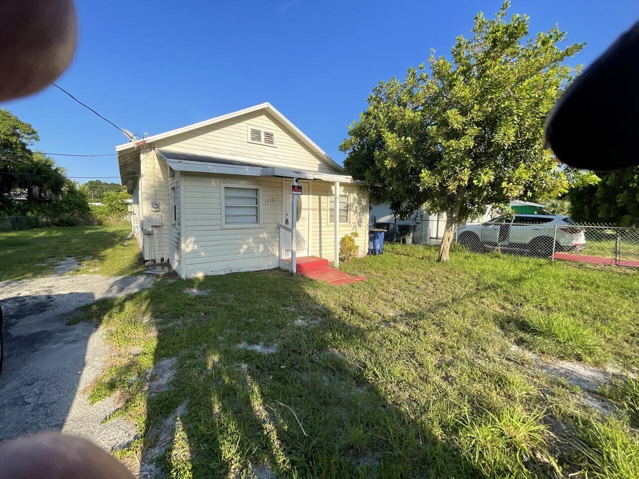 Spacious 3 bedrooms/ 1 bathroom, SFH with wood laminated flooring, window A/Cs, quiet street, near schools, enclosed porch, good size backyard, parking for 3 or more cars, 10 or less minutes to the beach, near Route 1. Sale is 'AS-IS'. Written MLS form 'AS-IS' offers will be considered.