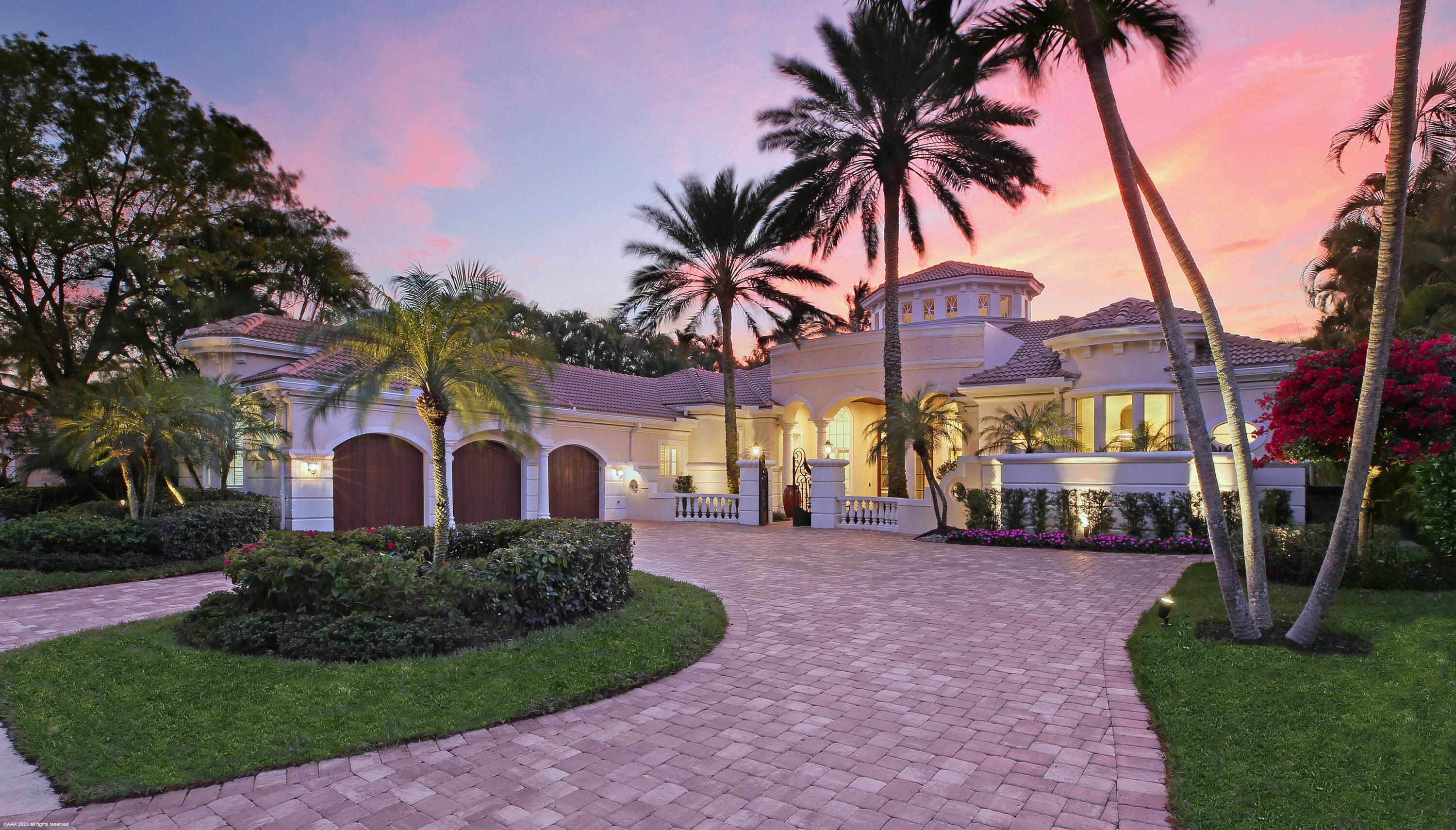 Own a piece of paradise in this stunning estate home in BallenIsles Country Club. Located in the exclusive enclave of St Thomas, this incredible custom-built golf course residence was recently renovated inside and out. Move-in-ready and designer decorated in its entirety with quality high-end furnishings – furniture – lighting – wall décor - accessories, etc., boasting a light & bright floor plan with exquisite architectural details throughout.   A gated entry with urn style fountains & gorgeous custom front door welcomes you into the double story foyer with elegant details. Perfect for entertaining- 2 spacious dining areas (formal and casual), wet bar w/ ice maker, light filled formal living room and a wonderful family room to relax and unwind.  Well equipped kitchen with walk in pantry, top of the line appliances, quartz countertops, and clerestory windows. Dine al fresco on the Bougainvillea encompassed patio complete with outdoor kitchen & built in BBQ. Guest suites are nestled away from the living areas down a private hallway and each include their own bathroom and walk-in closet. At the opposite end of the home, the Primary Suite showcases His & Her walk-in closets with built-in's, a lovely sitting area to soak in the views of the lushly landscaped backyard & custom pool/spa; His & Her bathrooms with lavish appointments, spa-like tub, over-sized luxurious shower with a tropical view, makeup vanity and ample storage and counter space. Two powder bathrooms and a well appointed office with custom built in's complete this impressive residence. 
Other features include- brand new roof with 7" gutters, new HVAC's, Sony TV's, SONOS ARC & Beam, plush carpeting in the bedrooms & office, 3M Scotchshield Ultra S800 window tint/film applied to all windows, upgraded LED lighting, brand new high impact rated steel reinforced garage doors w/ direct drive openers, whole house water filtration system, landscaping enhanced with low voltage solid brass LED lighting, and much more!
Take advantage of the Full Membership with access to all the impressive amenities and the six dining options that the club has to offer. Three championship golf courses and a top-ranked racquets facility by the USTA, the 65,000 sq. foot  Sports Complex features 30 courts20 Har-Tru® clay courts, a stadium court that seats 500, 9 Pickleball courts and one hard court, as well as a full-service tennis shop.  After a day of sports or exercise, indulge in the relaxing spa or freshen up for a night out at the full service salon.  BallenIsles truly has something for everyone!