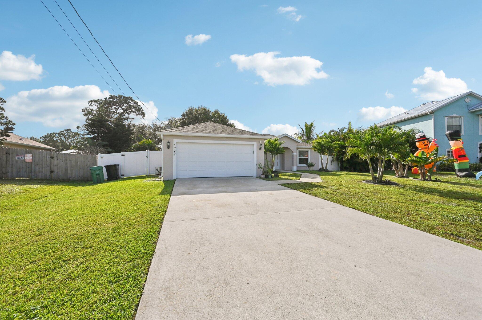 Welcome to this move-in ready 3-bedroom, 2-bath CBS home located in the desirable Torino area. Built in 2003, this property features fresh interior paint, newly painted exterior, and a brand-new A/C system installed in May 2025, including a split A/C unit in the 2-car garage—ideal for added comfort, workspace, or hobbies. The backyard offers a screened patio, private setting, and a newly installed shed (Oct 2024) for additional storage. A well-fed sprinkler system helps maintain the landscaping year-round. This home is vacant and easy to show, offering flexibility for a quick closing if needed. Conveniently located near I-95, shopping, dining, and everyday essentials. Don't miss this opportunity—schedule your private showing today!