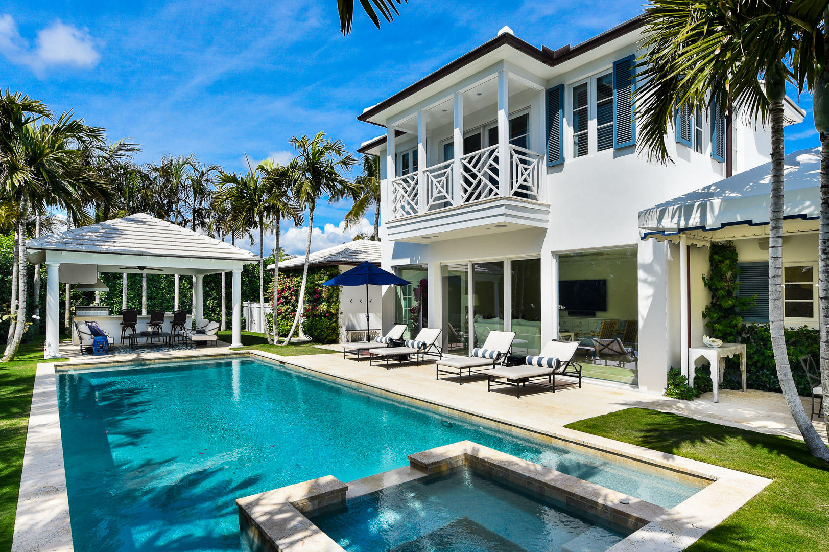 Beautifully renovated Beach House. Features 5BR/5.1BA, 2 car garage, pool, spa, and gorgeous grounds. Sunny and bright, spacious layout with eat-in kitchen with adjacent sun room, dining room, media room, and first floor master suite. Fantastic open poolside cabana with bar and summer kitchen perfect for outdoor dining. Oversized 17,400 sq ft lot. Just a few houses from the beach. Beach cabana.