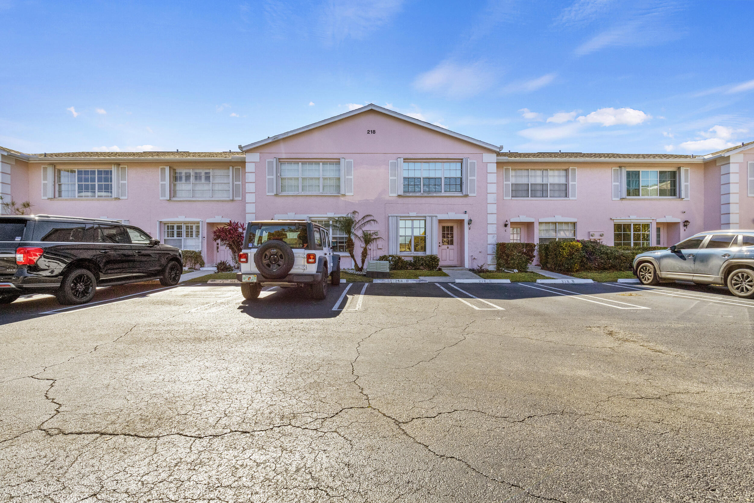 Welcome to this spacious townhome in the sought-after Charter Club community. All impact windows and doors, new roof (2024), water heater 2026 ,updated primary bath (2025). Features large bright living areas, and a private patio with double impact sliders leading to a fenced, private yard with turf. Upstairs offers spacious bedrooms with ample closet space. Low HOA covers roof, cable, landscaping, irrigation, and pressure cleaning. Enjoy the community pool and hot tub. Conveniently located near Wellington, major highways, downtown West Palm Beach, and PBI Airport. This property may quality for some currently running homebuyer grants and the upcoming Hometown Heroes Program  No rentals allowed. Home has an assumable mortgage below current rates (subject to lender approval)