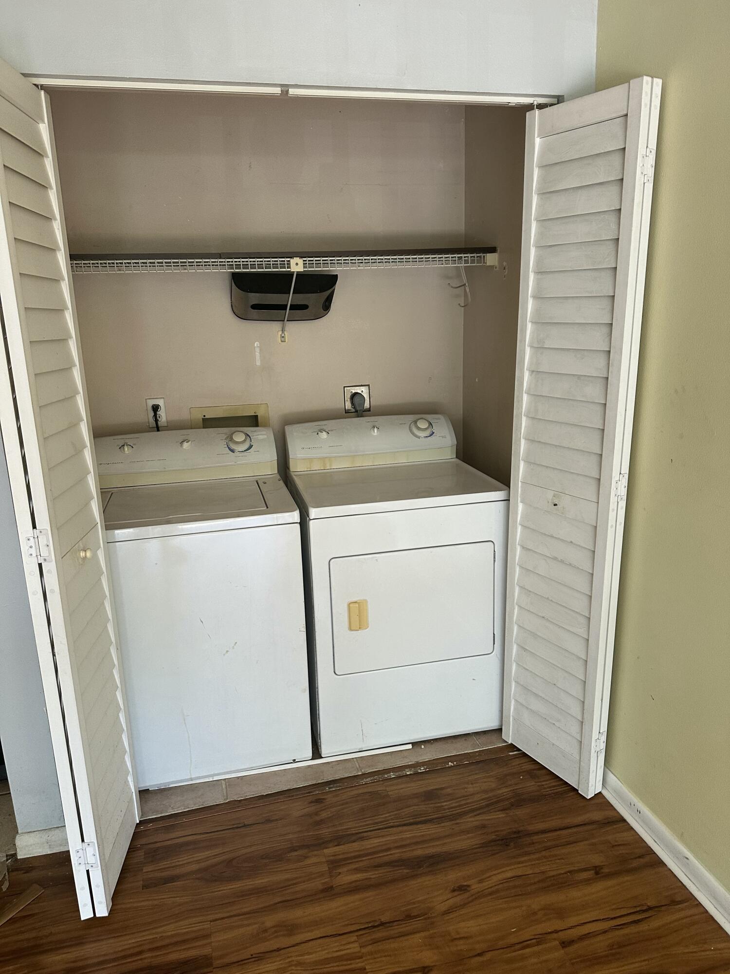 Investor Special or Perfect First-Time Home! Don't miss this fantastic opportunity to own a well-located 1-bedroom, 1-bath condo in the heart of West Palm Beach. This unit offers a functional layout, full-size washer and dryer, private balcony, spacious bathroom with soaking tub, and plenty of storage. While the interior is dated and ready for cosmetic updates, the bones are solid, making it the perfect renovation project for an investor, flipper, or owner-occupant looking to build instant equity. Conveniently located just minutes from Downtown West Palm Beach, I-95, Palm Beach International Airport, shopping, restaurants, and beaches. Bring your vision and transform this hidden gem into a beautiful home or income-producing investment. Being sold As-Is. Opportunity like this doesn't last! Use Showtime assist. Community gate is open. Condo Association may takes 30 days approval. No rental restrictions