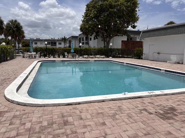 Welcome home to this bright and spacious, mostly renovated second-floor 1-bedroom, 1-bath condominium in the desirable Margate Village community. Enjoy peaceful mornings on your screened-in balcony overlooking the pool and tranquil water view—the perfect spot to relax with your morning coffee while taking in the surrounding nature.  This well-maintained unit includes one assigned parking space and is conveniently located near shopping, dining, parks, offering both comfort and convenience in a quiet community.  Rental Requirements:  First month's rent, last month's rent, and security deposit required to move in. Renters insurance required. No smoking /No pets Maximum occupancy: 2 people Association approval required with a minimum 650 credit score.