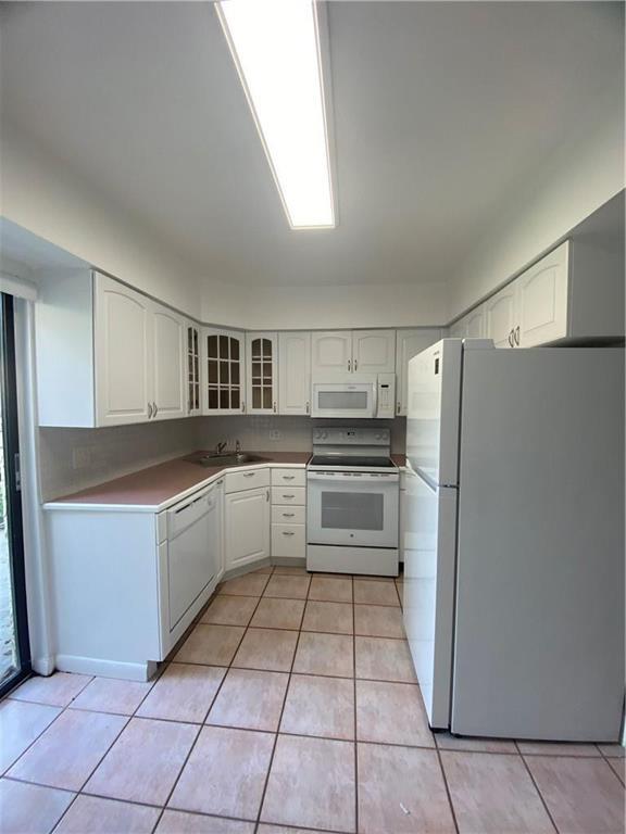 WIMBLEDON AT JACARANDA CONDO - Residential Lease