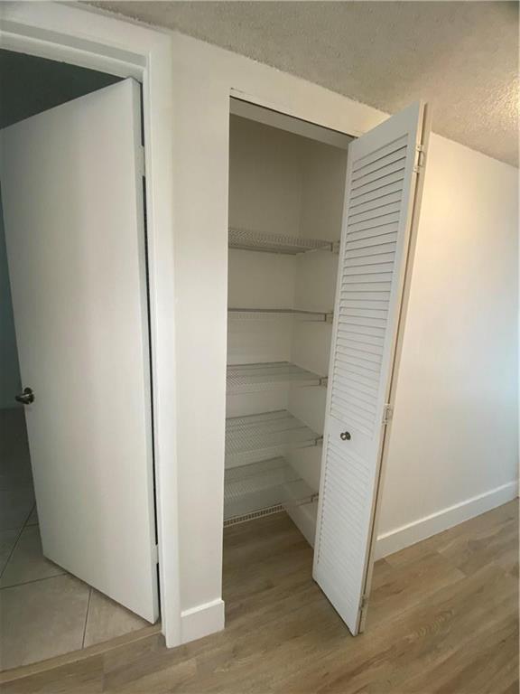 WIMBLEDON AT JACARANDA CONDO - Residential Lease