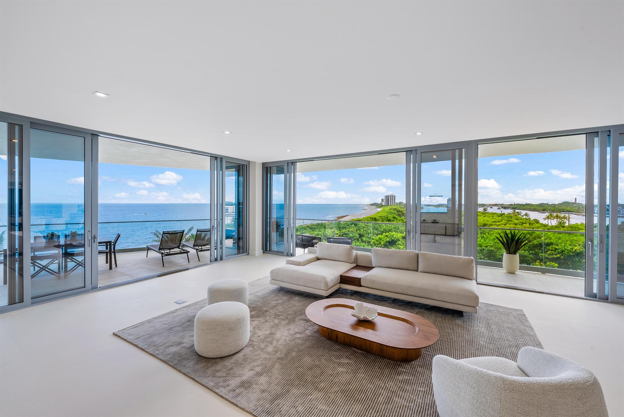 2022 new construction condominium nestled between two parks, preserves, with unobstructed views of the Atlantic Ocean and Intracoastal waterway. Some of the features include a private elevator and foyer, separate service elevator, floor to ceiling panoramic views of the Atlantic Ocean, a high-end kitchen with gas range and pot filler, 2 dishwashers, double wall oven, large kitchen island, laundry room and large 1003 sq ft wraparound balcony with private summer kitchen. This condo has 2 master baths and 2 walk-in wardrobes. Each of the 5 bedrooms have ensuite baths. Unit includes a 2-Car Climate Control garage. This exclusive gated, 21-unit building is pet friendly and has a private dog walk and washing station. Located along a dog friendly beach!