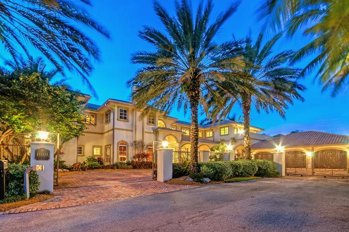 THIS DIRECT INTRACOASTAL 12,000 TOTAL SQ FT CUSTOM BUILT 5 BEDROOM,4 FULL BATH,2 HALF BATHS AND 3 CAR GARAGE RESIDENCE IS PERFECTLY SITUATED ON A 19,000 SQ FT,DOUBLE POINT LOT ON DELRAY BEACH'S EASTERN SHORE.ONLY STEPS TO THE BEACH AND MINUTES TO VIBRANT ATLANTIC AVE,THIS IMPRESSIVE ESTATE HOME OFFERS 295' FT OF WATERFRONT AND NO FIXED BRIDGES, AND CAN ACCOMMODATE YACHTS UP TO 100FT.FROM THE MOMENT YOU ENTER THE TWO STORY FOYER YOU WILL FALL IN LOVE WITH THE INTRACOASTAL WATERWAY VIEWS. AN IMPRESSIVE WINDING STAIRCASE LEADS YOU TO THE 2ND FLOOR GALLERY LOOKING OVER THE STUNNING LIVING AND DINING ROOMS.THIS ONE OF A KIND ESTATE FEATURES 2 MASTER BEDROOMS,A GOURMET KITCHEN AND OUTDOOR SUMMER BBQ KITCHEN. THE FINEST OF FINISHES WERE USED FROM EXOTIC IMPORTED MORROCAN WOODS TO POLISHED LIMESTONE FLOORS THROUGHOUT THIS HOME. THIS IS A ONCE IN A LIFETIME OPPORTUNITY TO OWN A DOUBLE POINT LOT IN AMERICAS MOST FUN SMALL TOWN.