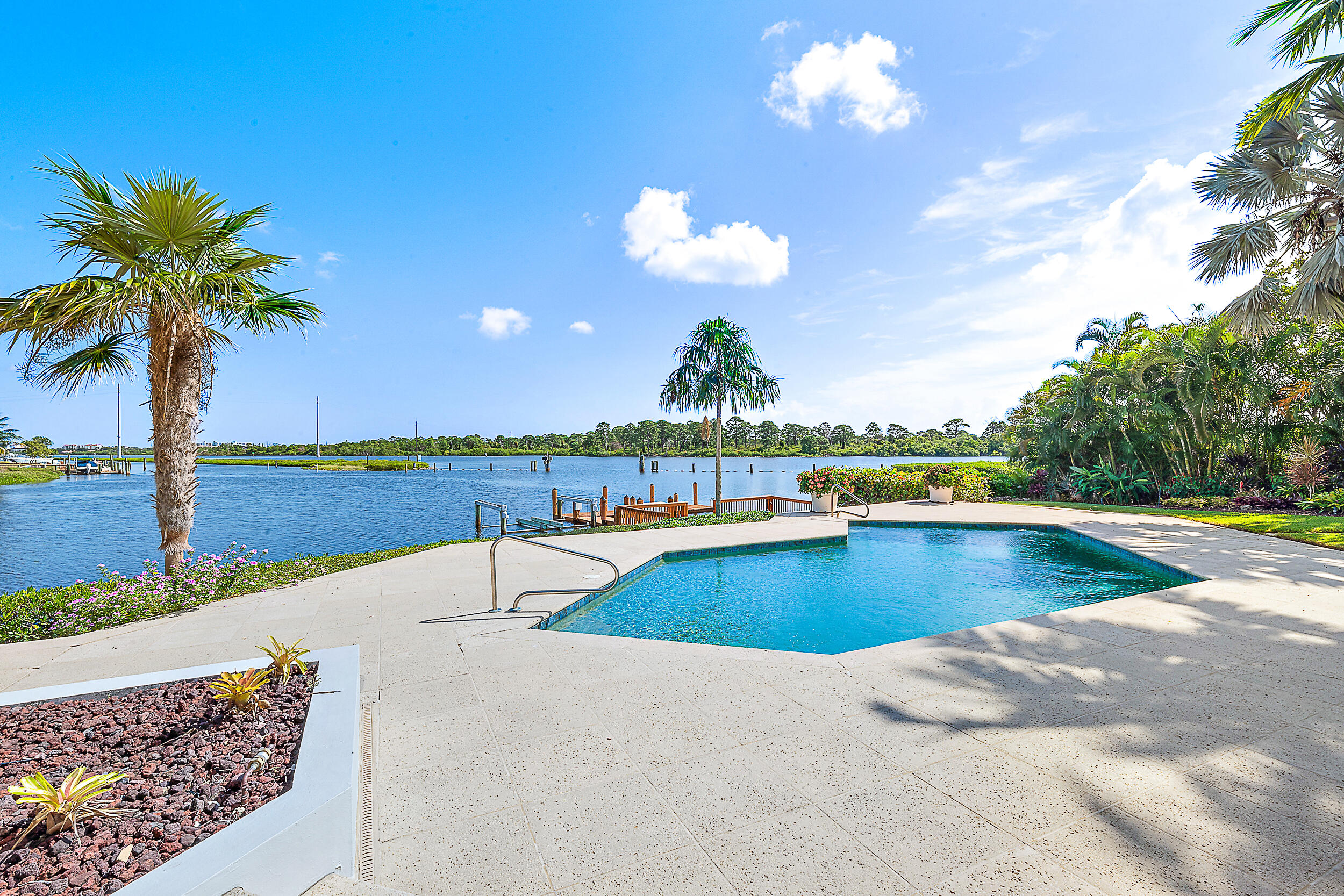 DIRECT INTRACOASTAL PROPERTY! This stunning 4-bedroom, 4.1-bathroom residence offers an unparalleled lifestyle with 180 feet of Intracoastal waterfrontage. Nestled on a peaceful cul-de-sac on  prestigious Commodore Island, this property boasts breathtaking views of the adjacent State Park. This is a rare opportunity to own a piece of paradise on Commodore Island. Schedule your private tour today and envision the lifestyle you've always dreamed of!