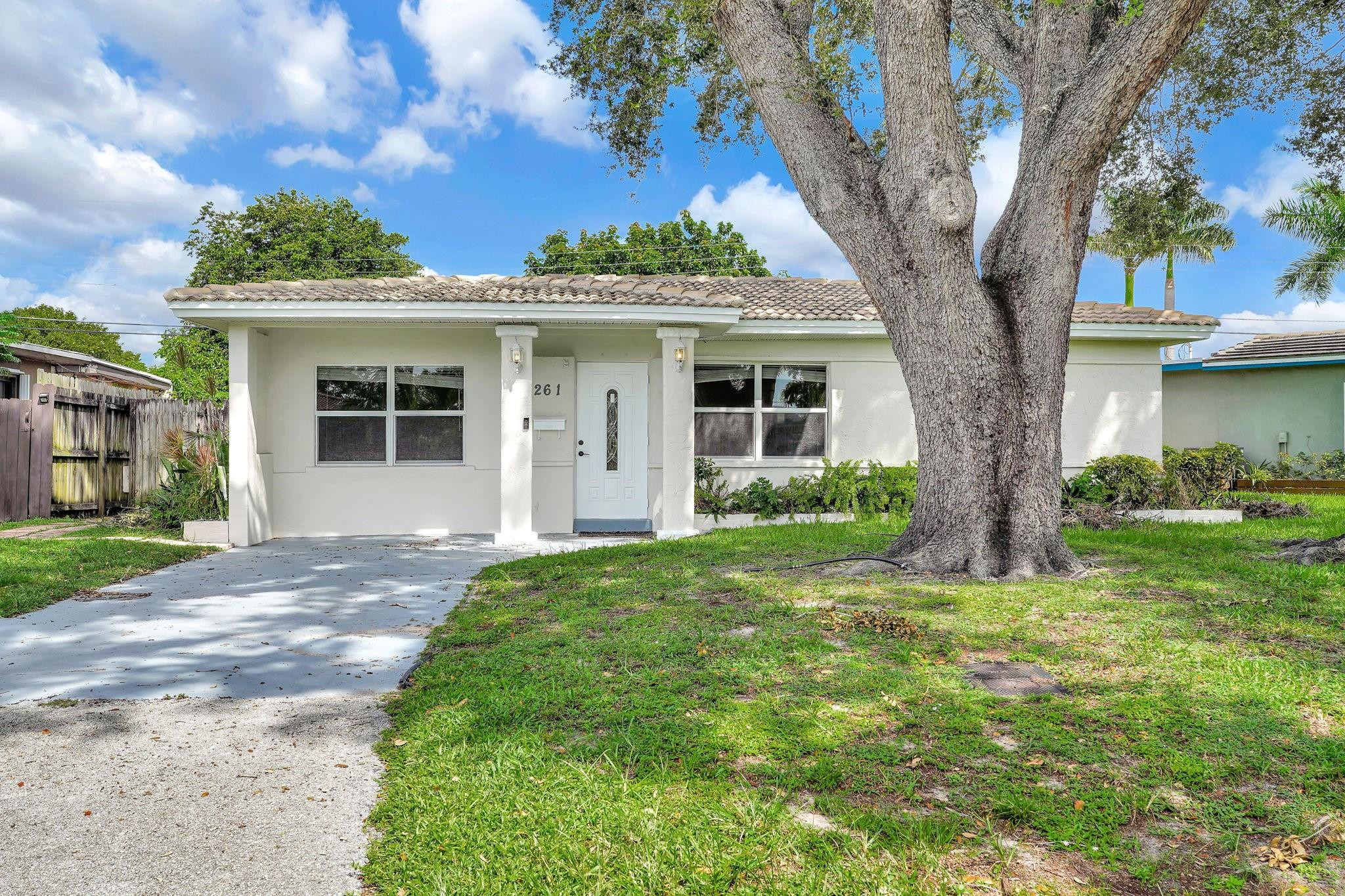 With a brand new primary bathroom this well maintained three bedroom, two bath home is located in the highly desirable North Andrews Gardens neighborhood of Oakland Park. Featuring fresh interior and exterior paint, a spacious dining area, and a private backyard patio perfect for relaxing or entertaining, this home offers both comfort and style. Additional highlights include in-home washer and dryer and plenty of parking. Ideally situated with quick access to I-95, you're just minutes from the beaches and the vibrant dining, shopping, and nightlife of Fort Lauderdale, Oakland Park, and Wilton Manors.