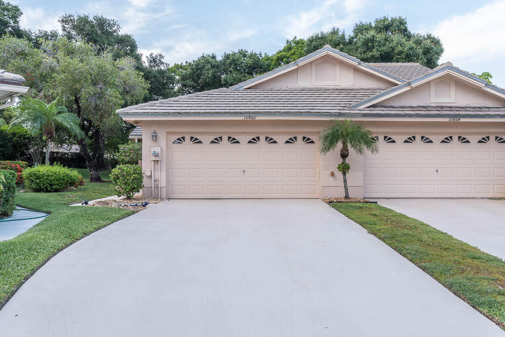 Nestled in the community of Brighton Lakes is this lovely 2-Bedroom/2-Bathroom Villa situated on a quiet cul-de-sac. Beautiful White & Bright recently updated kitchen with new appliances. Vaulted Ceilings. A Large, Enclosed Lanai gives you extra living space, privacy, shaded with a serene, garden view. There is wide plank, wood-like tile flooring throughout. Full hurricane protection with accordion shutters on each window. Conveniently located off Military Trail near the new Publix shopping center, many restaurants and stores, only 6 miles to the beach and 20 mins to PBI Airport. This community has one of the lowest HOA fees, which includes landscaping, internet and basic cable, a great clubhouse with tennis, pickleball and a welcoming pool... plus the friendliest group of neighbors!