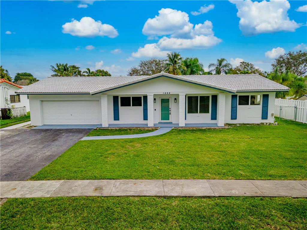 Welcome to your new home in the highly sought after Royal Palm Estates with BRAND NEW EVERYTHING! Walk in and find beautiful, oversized porcelain tiles wall to wall throughout the house. Kitchen with NEW stainless steel appliances and NEW Calcatta marble countertops. NEW impact windows and doors! Master suite has NEW luxurious shower with double shower heads and wands. Enjoy your spacious backyard with over 2000 sq ft. of NEW Limestone deck and refinished pool! NEW Trane AC that keeps your house nice and cool.