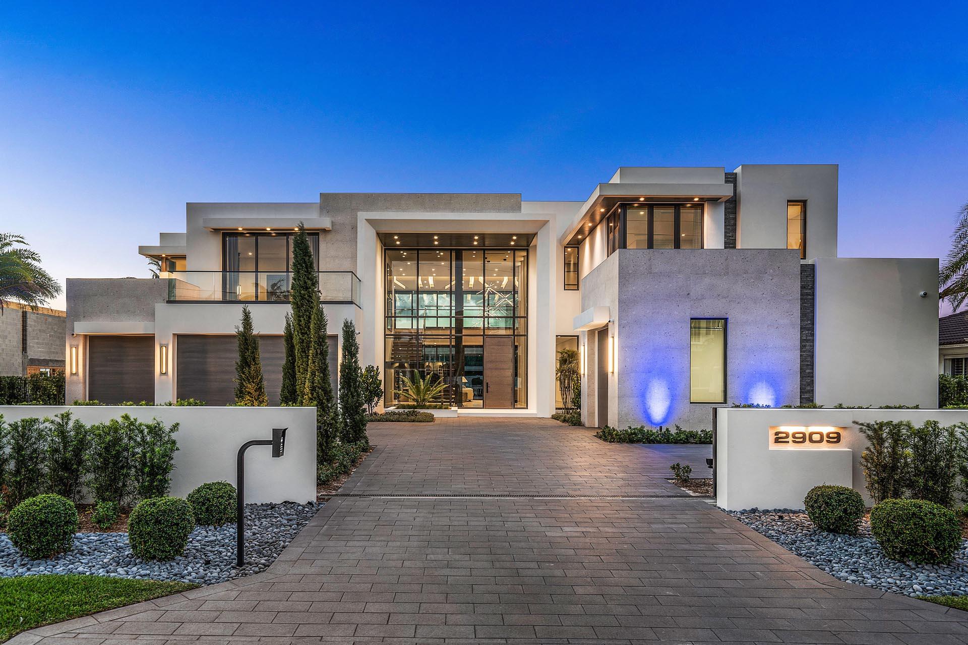 covered loggia with built-in BBQ, dazzling 40-foot custom pool with spa, and gated motor court servicing 4 garages and a grandiose front entry. Interior design by Jack Lonetto of The Decorators Unlimited. Buyer to pay documentary stamp taxes on the deed and title insurance.