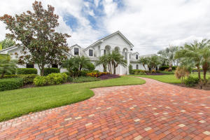 This estate is situated at Wellington’s most exclusive addresses, walking distance to the Winter Equestrian Festival and Global Dressage Festival grounds. The magnificent property boasts four bedroom suites, as well as a custom office and a new 16-stall equestrian facility. Appeal- ing design details include high ceilings, Brazilian hardwood, Berber carpeting and marble flooring. The interior is finished with custom mouldings, custom cabinets, overlay and custom woodwork through- out. Extensive outdoor living areas include covered porches, a loggia, a Californian-style kitchen and grill, as well as a luxury pool and spa. The state-of-the-art show barn includes four-bedroom groom’s quarters, custom tack rooms, an approx. 250 x 180 ft all-weather ring, storage garages.
