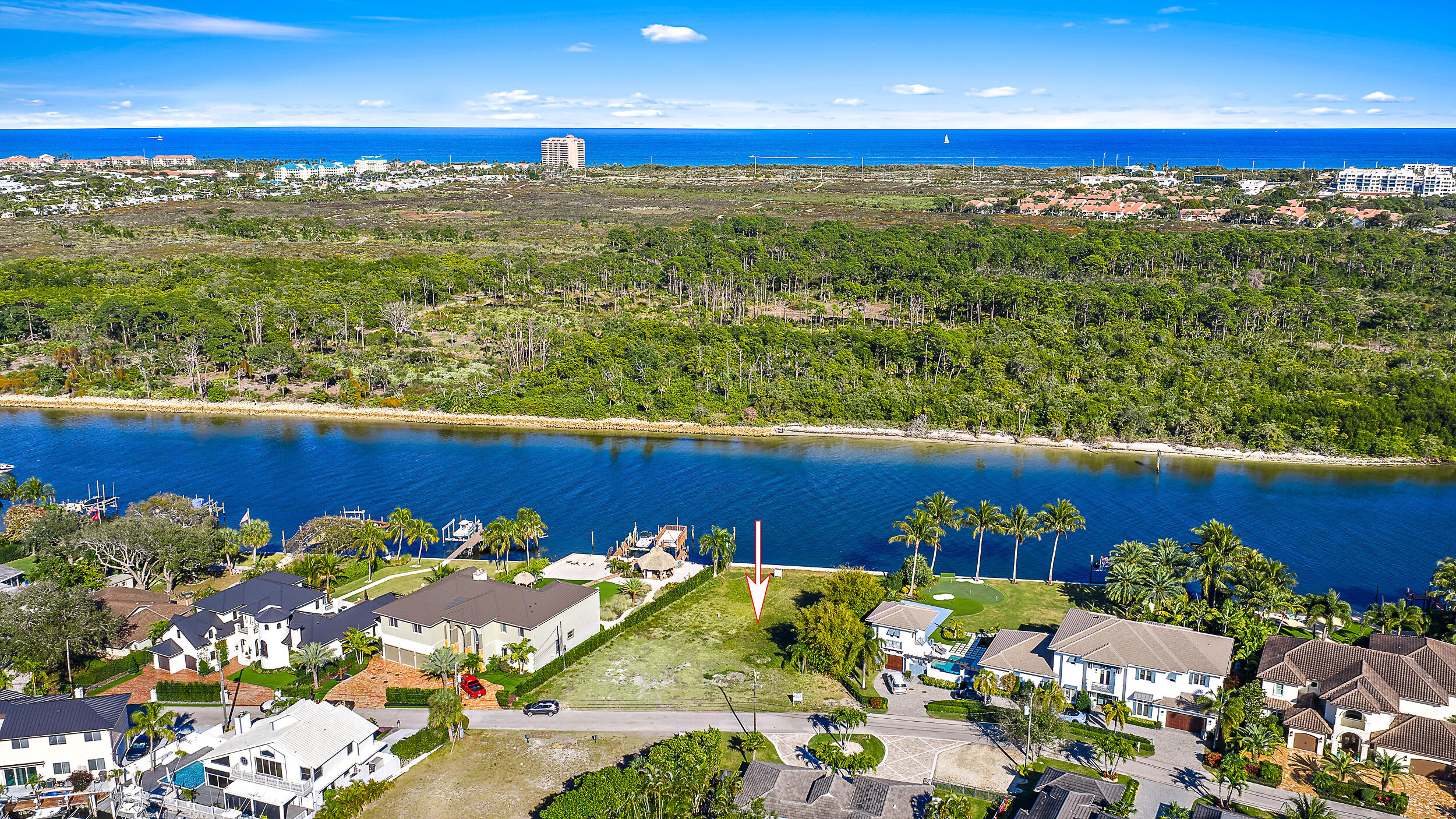 Build your dream home on this fantastic Intracoastal lot boasting panoramic views of a County Preserve and 105' of frontage. Plans and elevations available upon request.