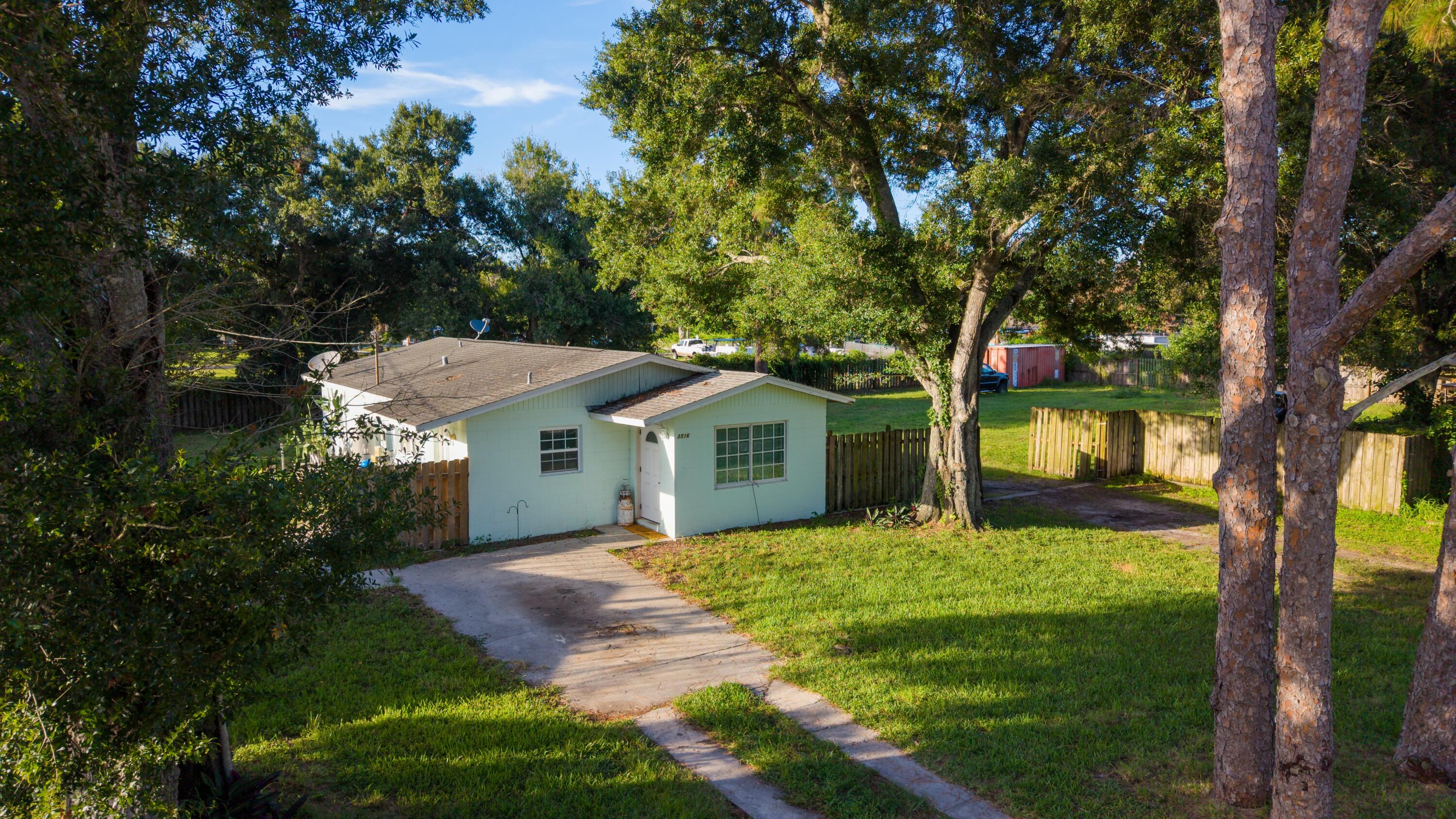 Unique opportunity to own a secluded property in the heart of Fort Pierce with endless potential and possibilities! Property includes a total of 3 parcels with a 2 Bedroom / 1.5 Bath old school concrete block bungalow with newer A/C. Ideal for a small family starting out with endless potential to add on or as an investment property! Take advantage of recent changes to Fort Pierce building code by adding this property to your investment portfolio and building additional houses on the other vacant parcels right next door! Be sure to schedule a showing today.