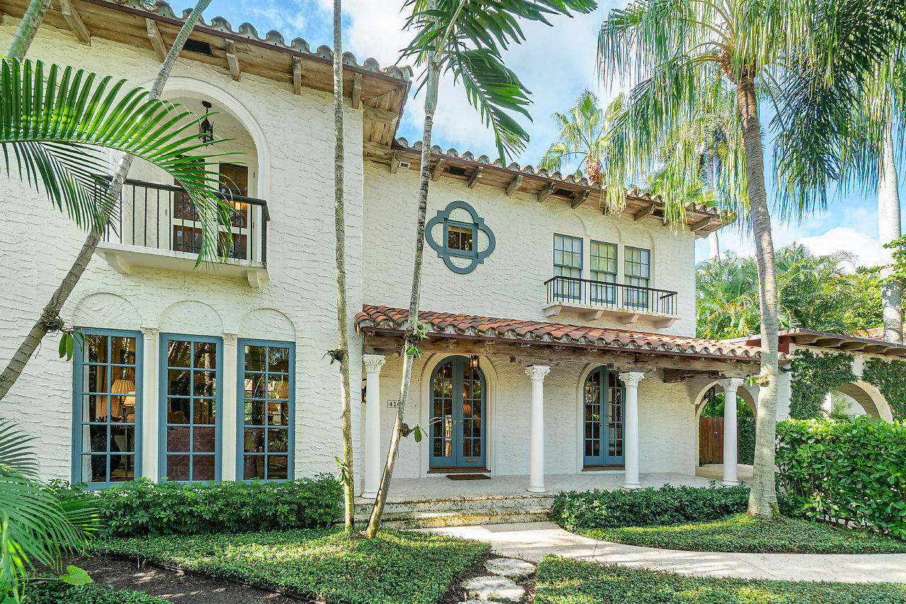 Traditional, updated 1920's Mediterranean located on the lake block with a well-designed floor plan that reveals proportion, scale and logical flow between rooms inside and out. Full of old-world charm and alluring details, all rooms open to a center courtyard for the ultimate dining experience. The new kitchen flows to a breakfast room, courtyard and pool. The center courtyard also opens to a covered loggia, and a cabana that includes a separate office, bathroom, and full upstairs apartment with kitchen. Lush landscaping provides total privacy from the road, both courtyards and pool. Quality features: pecky cypress ceilings, partial new impact glass windows and French doors, new bathrooms, hardwood floors, marble floors in upstairs bathrooms and heated saltwater pool.
