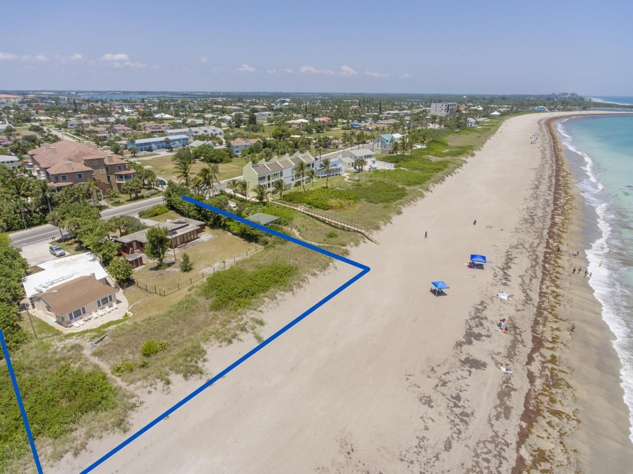 Oceanfront Development Opportunity - Prime St. Lucie Beachfront location. This rare offering features 159 feet of direct ocean frontage, perfectly suited for an exceptional oceanfront development. The property is currently deeded as two lots, with flexible build-out options: Up to 3 homes on 53' x 225' lots, or Up to 4 homes on 39' x 225' lots. All underground utilities are already in place, including fiber optic service. The site is located within the St. Lucie County Erosion Control Zone with a beach renourishment plan in effect, and both lots are grandfathered beyond current setback lines. Additional features include: *Private beach access on both lots *A1A frontage with two curbed driveways and storm sewer Taxes listed are for both properties