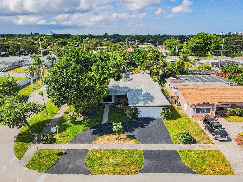 Corner lot beautiful landscape.New paint inside and out. New wood grain ceramic tile floors. New double pane hurricane impact windows. Has a large pantry also a bonus room or office. 20 x 10 shed workshop or storage. Sprinkler system. GE washer and dryer. All stainless steel appliances. Built-in sauna. A large pool with covered porch. Brand new pool screen Has a beautiful fire pit area out front. Screen pool area.Walk-in closet in master bedroom with built-in storage. Air conditioner is only 4 years old.