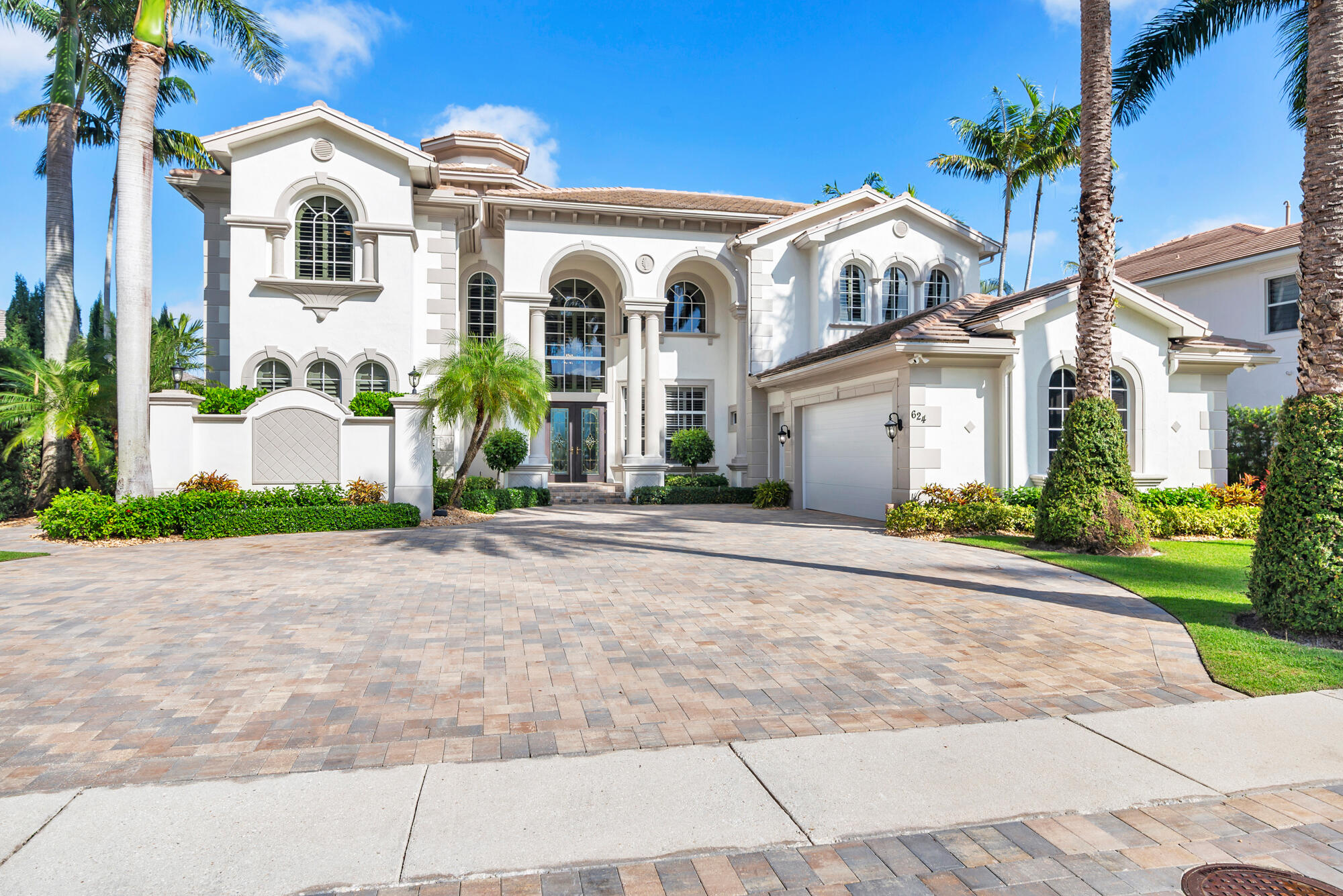 Hermitage Circle under $5M!!! Magnificent Villa Rosa Gem on the 17th green overlooking lake and fairway. This home offers 5 bedrooms 6.5 baths, private office and loft upstairs over the dining room. The pool and patio were redone in 2022 along with a complete landscape redo on both sides of the home and a new roof installed in 2023. Along with that, a state of the art kitchen was designed and installed. Spacious family space with soaring ceilings in the living room complete with a fire place and a family room off the kitchen for fun entertaining. A wet bar and wine cooler bring it all together. Out back is a custom heated pool and spa with all the comforts of South Florida living. Club amenities offer an Arnold Palmer signature golf course, pickleball, tennis, fitness center and exclusive fine dining. 24 hour manned security gate gives you the privacy and security you deserve.  Located in Palm beach Gardens, your just minutes to world class dining and shopping and just a 20 minute ride to Palm Beach International Airport.