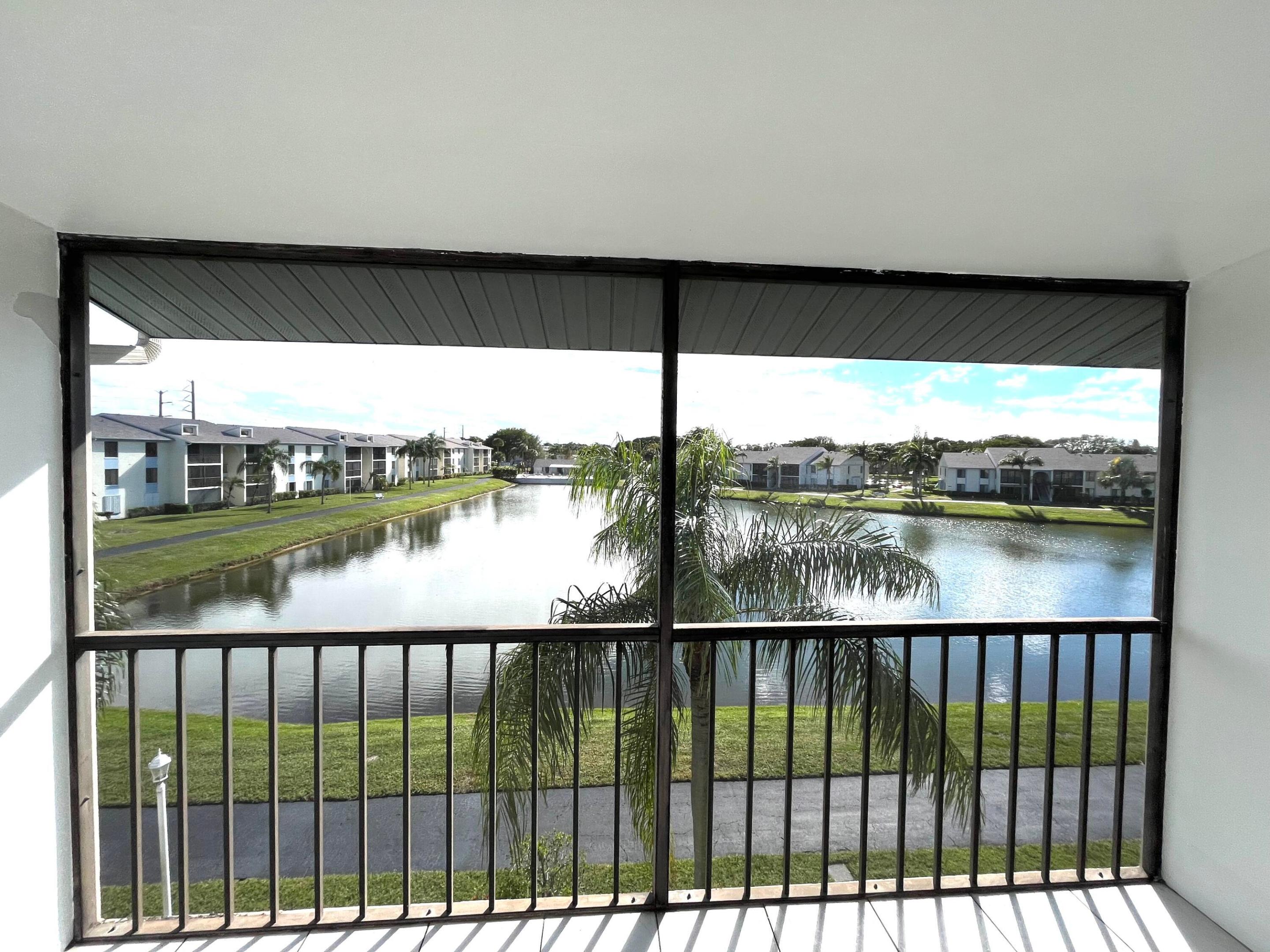 Beautiful & spacious 1BE/1BA unit on the top, third floor*Completely renovated a couple years ago- newer ktch cabinets and SS appliances*Replaced interior doors, medicine cabinet, toilet & faucets*High vaulted ceiling*Screened & covered balcony with an amazing water view*No carpet here - tiles in living area & pergo in the BE*Assigned parking spot right in front of the entrance*Washer & dryer in the apartment * Water and basic cable included in rent *All ages subdivision * 24 hrs man-gated community * Great amenities * Central location! Come and see it - you will not be disappointed!