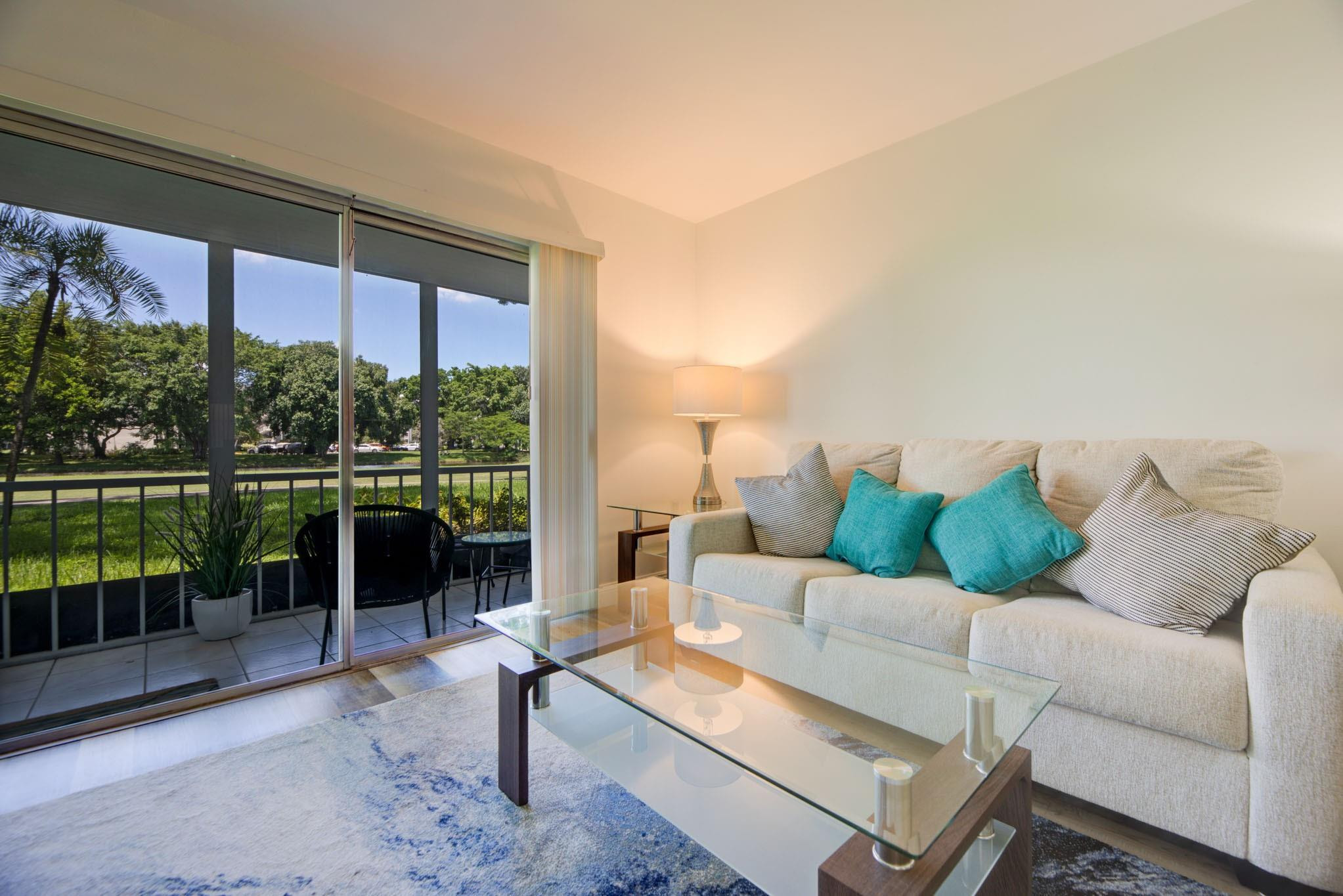 AMAZING AND UPDATED 1st FL. ONE BEDROOM CONDO WITH A WONDERFUL WATER & GOLF VIEW! This spacious condo has an updated kitchen and bathroom with granite countertops, new cabinets, flat ceiling (no popcorn) and a pass-through in the kitchen. All Kitchen appliances and AC less than two years old! Water heater is 8 years old. GORGEOUS COLORFUL LAMINATE FLOORING THROUGHOUT THE CONDO. NO CARPETS! HUGE PATIO TO SIT ON WITH YOUR MORNING COFFEE OR SIPPING WINE AT SUNSET LOOKING AT YOUR BEAUTIFUL LANDSCAPED AREA LEADING TO YOUR WATER VIEW! SOME FURNITURE NEGOTIABLE. WYNMOOR has many amenities like a restaurant on site, golf, FREE BASIC CABLE TV, Tennis, exercise facility, free buses, PICKLEBALL, BILLARDS, POOLS, BAR-B-QUES, ARTS & CRAFTS WORKSHOPS & MUCH MORE!