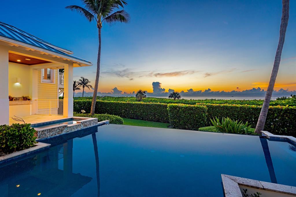 Begin each day watching the sunrise along your private & quiet stretch of beach. At the end of the day watch the moon rise over the ocean as the sea turtles come to nest in the sand.
This dreamy Key West oceanfront residence is set high above the dune with sparkling ocean views. Meticulously designed by architect Randall Stofft & executed by Cudmore Builders, this residence offers every amenity.
The light filled open floor plan is accented with stunning architectural details throughout. Stylish and casual the home features a true gourmet cook's kitchen, spacious and luxurious main level Master Bedroom suite, and 3 guest bedrooms. The infinity pool blends seamlessly with the sea and is surrounded by covered lanais and patios providing perfect entertaining spaces. 33 HERSEY DR, OCEAN RIDGE

Partial list of features:
*Custom Built 2004
*Randall Stofft -  Stofft & Cooney Architect
*Cudmore Luxury Builders
*4111 sq ft of AC living space
*3000+ sq ft of storage space
*3 car garage
*Ultimate brand impact windows and doors
*CBS construction, Aluminum Roof
*Cul de sac
*17 ft elevation
*.5261 acres, 98' x 170' direct ocean property /private beach
*4 Bedrooms, 3 full baths
*Oceanfront Master bedroom with sitting area, giant walk-in, Hickory wood floors
*Baths feature Porcelanosa fixtures 
*Elevator
*Gourmet kitchen, Sub Zero side by side  fridge, Miele Master Chef Wall Oven, Wolf 6 Burner gas range & hood, Miele dishwasher, steam oven, large walk-in pantry
*Full Impact/Hurricane windows and doors
*EWS water filtration (whole house)
*24" x 24" Turkish marble floors main rooms
*Hardwood in Bedrooms
*Central Vac
*Infinity Pool and spa
*Summer Kitchen
*500 gal propane tank