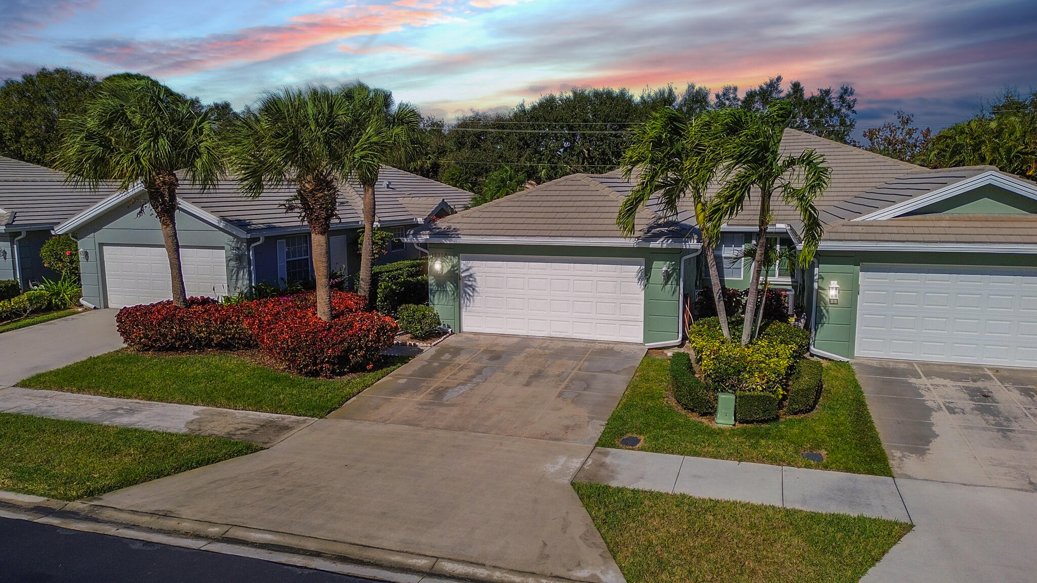 Well-maintained 2BR/2BA/2CG Extended Capri villa located in desirable Lakes at St. Lucie West. Divosta sold build poured concrete home features tile & laminate flooring throughout, open floor plan with living, dining room & family room. Kitchen offers granite countertops, stainless steel appliances & a whole-house water filtration system. Spacious primary suite includes a walk-in closet, dual vanities & walk-in shower.  Additional highlights include French doors, a large covered and screened lanai, with a private fenced backyard—perfect for relaxing or entertaining, 2012 Roof, 2022 A/C, 2024 new plumbing, 2019 water heater.  Community amenities include a clubhouse, pool, pickleball, tennis & more. Lawncare, cable included in HOA dues