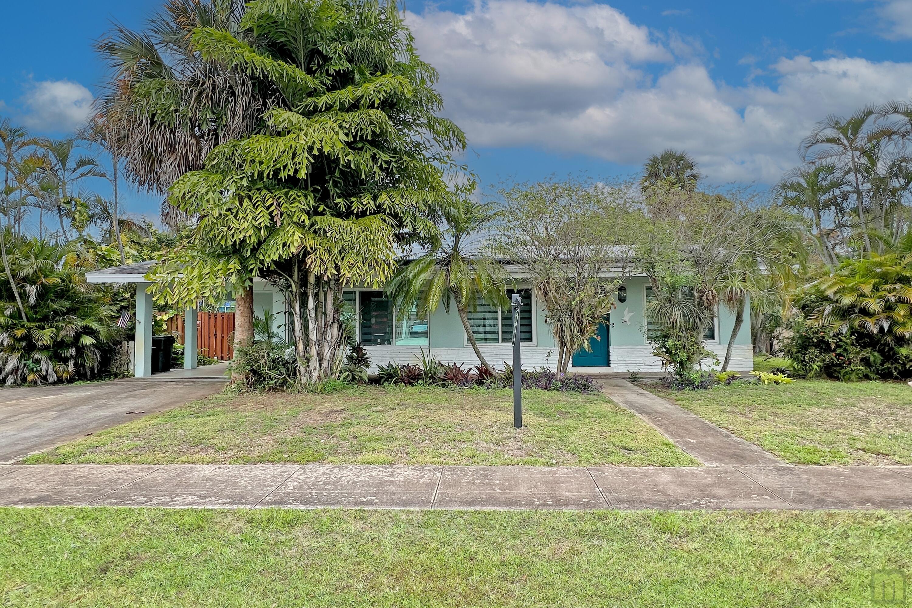 NEW OWNED SOLAR, that's right!  Enjoy a super low electric bill in this beautifully updated home in South Coconut Creek. 3 roomy bedrooms & 2 bathrooms with a private primary en-suite. The kitchen is the heart of any home and it shows with clean white shaker cabinetry, stainless steel appliances, quartz countertops & peninsula seating. Stylish wood-look tile flooring, modern bathrooms featuring glass shower enclosures, & designer tiles. Modern motorized blinds adorn large windows that flood the space with natural light.  2016 Roof, 2021 A/C, 2024 water heater, updated electrical & more! Enjoy Florida living in a beautiful in-ground pool, covered patio & roomy, fenced yard.  yes, you can have it all - and NO HOA!!! Close to schools, shopping, the turnpike & just 7 miles to the beach.