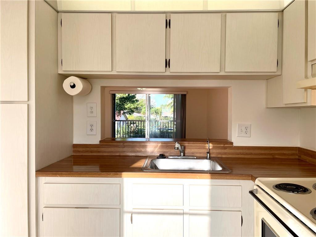 Beautiful, immaculately clean, peaceful 2nd floor, 1 Bed /1.5 bath condo in the heart of Coral Springs with low association fees. Relax on your screened patio overlooking the tranquil view of the water.  Includes walk-in closet, Washer/Dryer, 2020 Central A/C, & Water, Accordion Shutters. Conveniently located walking distance from restaurants, bars, grocery store & more.  One block away from Coral Springs City Hall and the brand new Cornerstone Downtown Coral Springs which will have even more upscale restaurants, bars and cafés, shops and office space.  Close to the Sawgrass Expressway and turnpike & A-Rated schools.  Enjoy the sun by the community pool. Community scheduled to paint exterior buildings and re-surface parking lot this year. Condo application and other docs are attached to MLS supplements.
