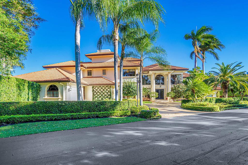 This magnificent, three-story European-inspired villa in Boca Raton's The Sanctuary underwent a complete ground-up renovation in 2011 and impresses from first look. With over 13,700 square feet of refined living space that includes four bedrooms, six and a half baths, complete staff quarters and an elevator, luxurious details abound. From the gorgeous flooring with inlaid stone, marble and granite to ceiling details that call to mind the most luxurious, world-renowned resorts, no detail has been overlooked. All of this and much more is set on over 210 feet of prime deep water with fully equipped yacht dock.
A bar, media room, large office/ library, loft and maid's suite add to the impressive list of amenities in this well-appointed home.