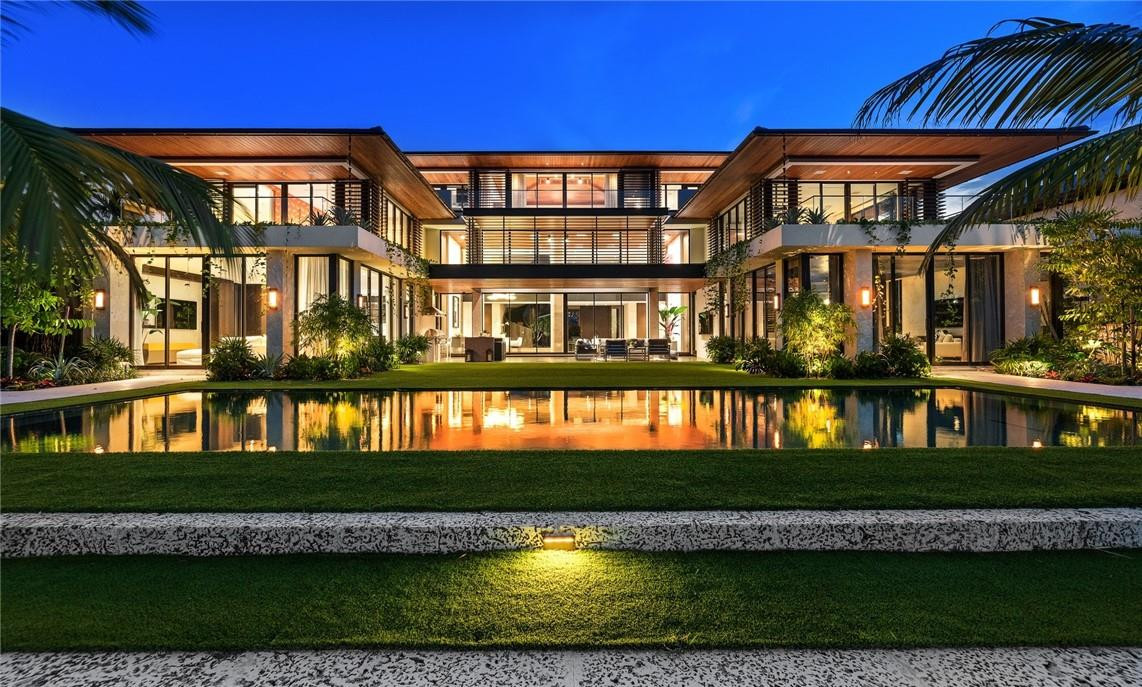 Extraordinary & spectacular deepwater custom residence - Polynesian/Balinese architecture offers organic warmth & style on one of Harbor Beach's finest isles! Architectural Digest quality, artisanal entry doorway, sculptural staircase, open living room, double sided coral fireplace & dining room. Exotic Eucalyptus, Oak & Cumaroo wood custom cabinetry. Eggersmann Chef's kitchen adjoins the family room & also features additional catering kitchen.1st level includes office, VIP guest suite & club/media room with fully equipped wet bar. 2nd level offers a guest lounge, 4 bedroom suites, bonus room & gym with morning bar. Ornare closet systems .3rd level comprises Master Suite with separate his/her baths/closets. Full Savant low voltage automation. Expansive outdoor terrace, stunning landscaping - Walled & gated for privacy & security with water features surrounding the front pathway- All Sub-Zero & Miele appliances throughout.- Club Room includes two Sub-Zero Wine Refrigerators, Beer Refrigeration & additional Refrigeration unit.- Dramatic sculptural spiral staircase in finished in Venetian Plaster- European White Oak Floors- Savant Home Technology System- Master Retreat has oak beams with tongue & groove ceilings, two separate baths with steam showers & custom closets