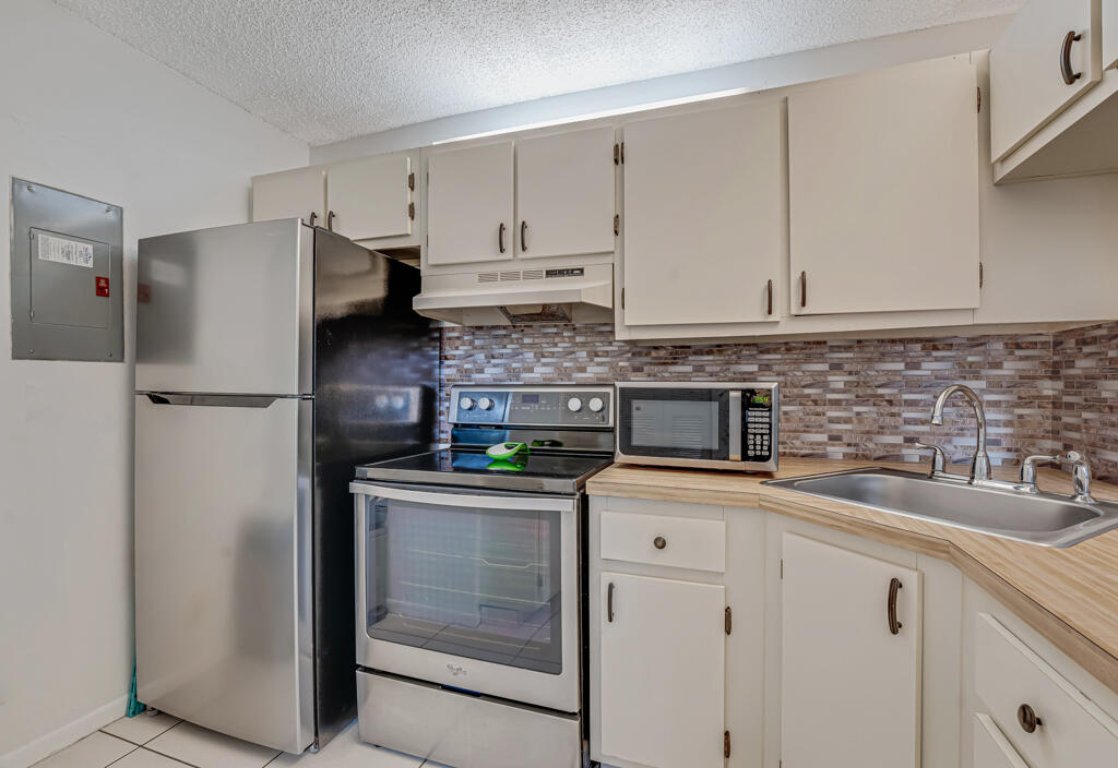PALM CLUB VILLAGE II CONDO - Residential