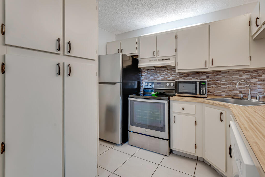 PALM CLUB VILLAGE II CONDO - Residential