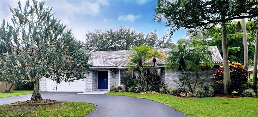 One of a kind 4 bedroom, 2 bath, updated split-bedroom, open floor plan, pool home in sought after Pine Ridge. Vaulted ceilings greet you as you are drawn from the formal living & dining rooms through to the kitchen & great room with custom wall unit. Gourmet kitchen with huge granite island, custom cabinets & an oversized pantry. The primary suite features cathedral ceilings, dual walk-in closets & a remodeled bath with custom shower, dual sinks & a spa-feel. Large bedrooms & updated cabana bath. Entertainers' private tropical oasis with hot tub waterfalling into the oversized pool, screened area with wet bar. Fenced yard for pets with lemon, grapefruit & avocado trees. Freshly painted & knockdown ceilings. Newer A/C, water heater, pool equip. & sprinkler pump. Accordion shutters.