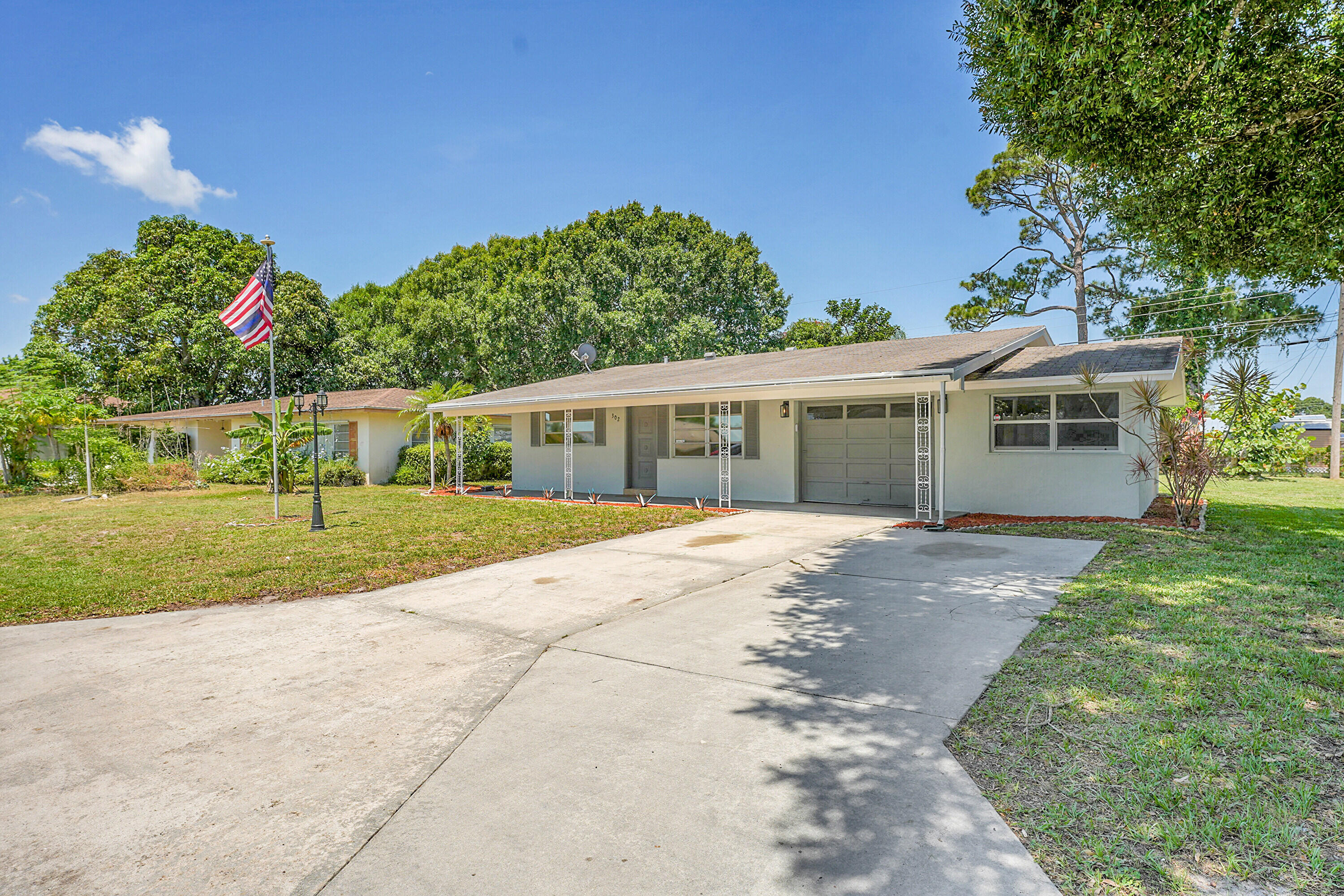 Affordable, Stylish, and Move-In Ready!
This beautifully remodeled 2-bedroom, 1-bath home is perfect for first-time buyers, downsizers, or anyone looking for a low-maintenance lifestyle. Freshly painted inside and out with brand-new light fixtures, fans, microwave, and dishwasher—it's turn-key and ready to go!

The kitchen boasts new cabinets, granite countertops, and a modern backsplash, while tiled flooring throughout the home keeps things clean and cool.

The oversized one-car garage offers space for a laundry area and a workshop—hello, hobbies! Need a third bedroom? The large Florida room is ready for that upgrade.

Step outside to a spacious backyard—plenty of room for pets, parties, or planting a garden. Don't miss it—call today for your private tour!