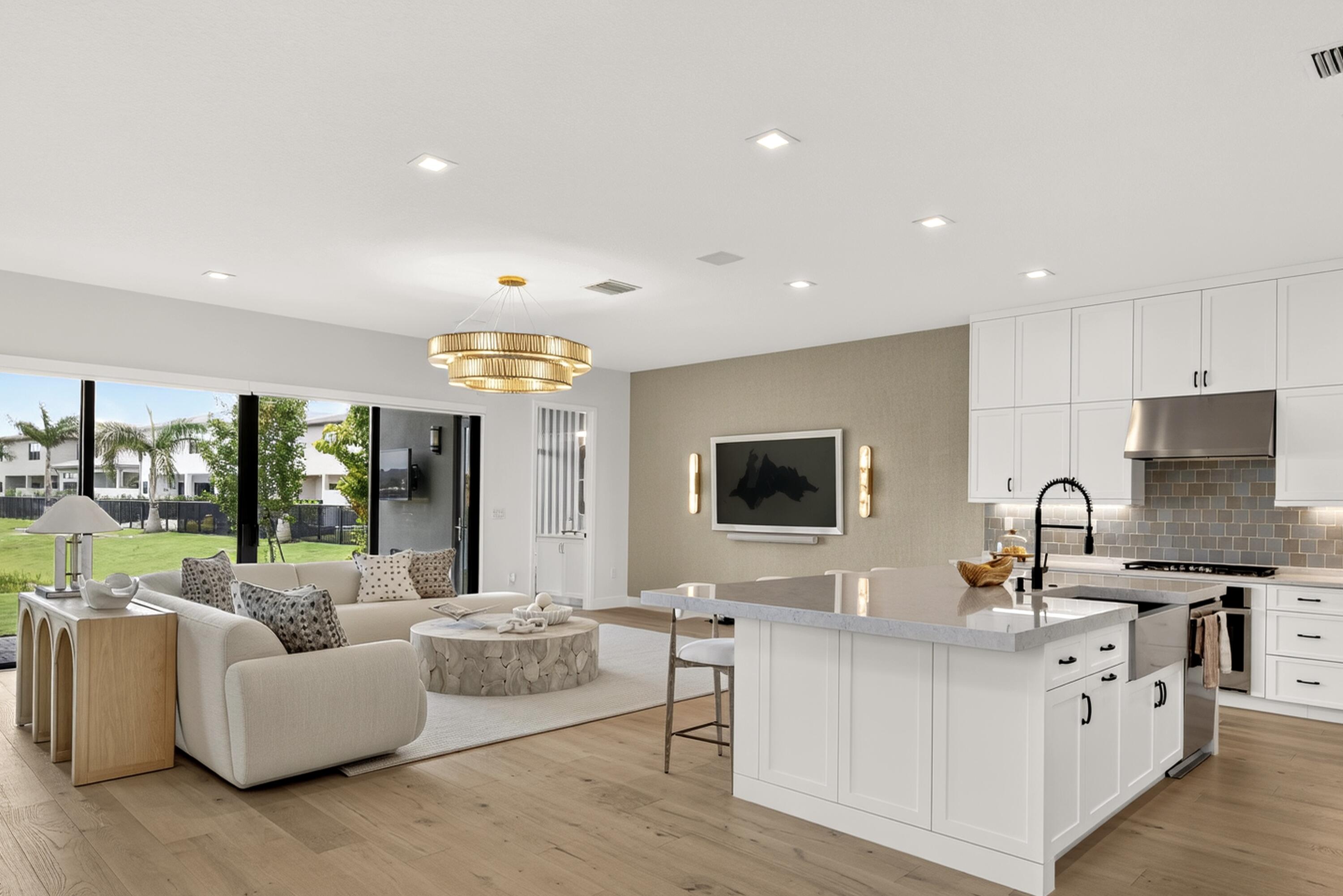 Live like every day is a five-star resort stay. Brand-new 2026 Corsica — the most sought-after model in Lotus Edge — with 5 bedrooms, 6.5 baths, loft, club room, theatre room & 3-car garage across nearly 5,000 sq ft, with one of the few long lake views in the community. Over $430 in upgrades: wide-plank hardwood throughout, porcelain accent wall, built-in wine bar, motorized shades, smart home, prewired outdoor kitchen & fixtures from Restoration Hardware and Arhaus. Soaring two-story great room, gourmet kitchen & primary suite with dual walk-in closets. With Lotus Edge over 90% sold, one of the last chances to own an exceptional, fully finished home here — no design center, no construction wait. New 39,000 sq ft clubhouse: resort pools, restaurant & bar, fitness, padel, tennis and spa.