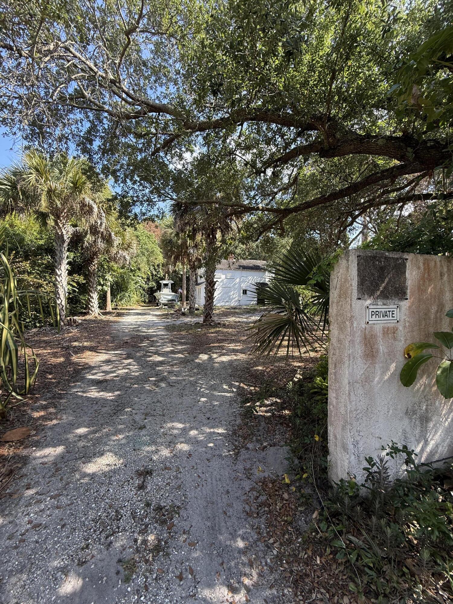 Rare opportunity in historic Stuart! Incredible build site in a prime location—design your dream home while enjoying immediate value and future boating convenience. Lot 8 offers 125 ft of frontage on St. Lucie Blvd with deeded water access just a short walk with easy access to the ocean for boating enthusiasts. A private dock is currently being permitted and scheduled for completion September 2026, accommodating up to a 60 ft boat. The lush property features mature native landscaping and several large, producing mango trees. Existing two-story duplex (upper/lower units) to do with what you please. Premier builder available for a custom residence, with a recently completed home next door showcasing quality and design. Exceptional build site!