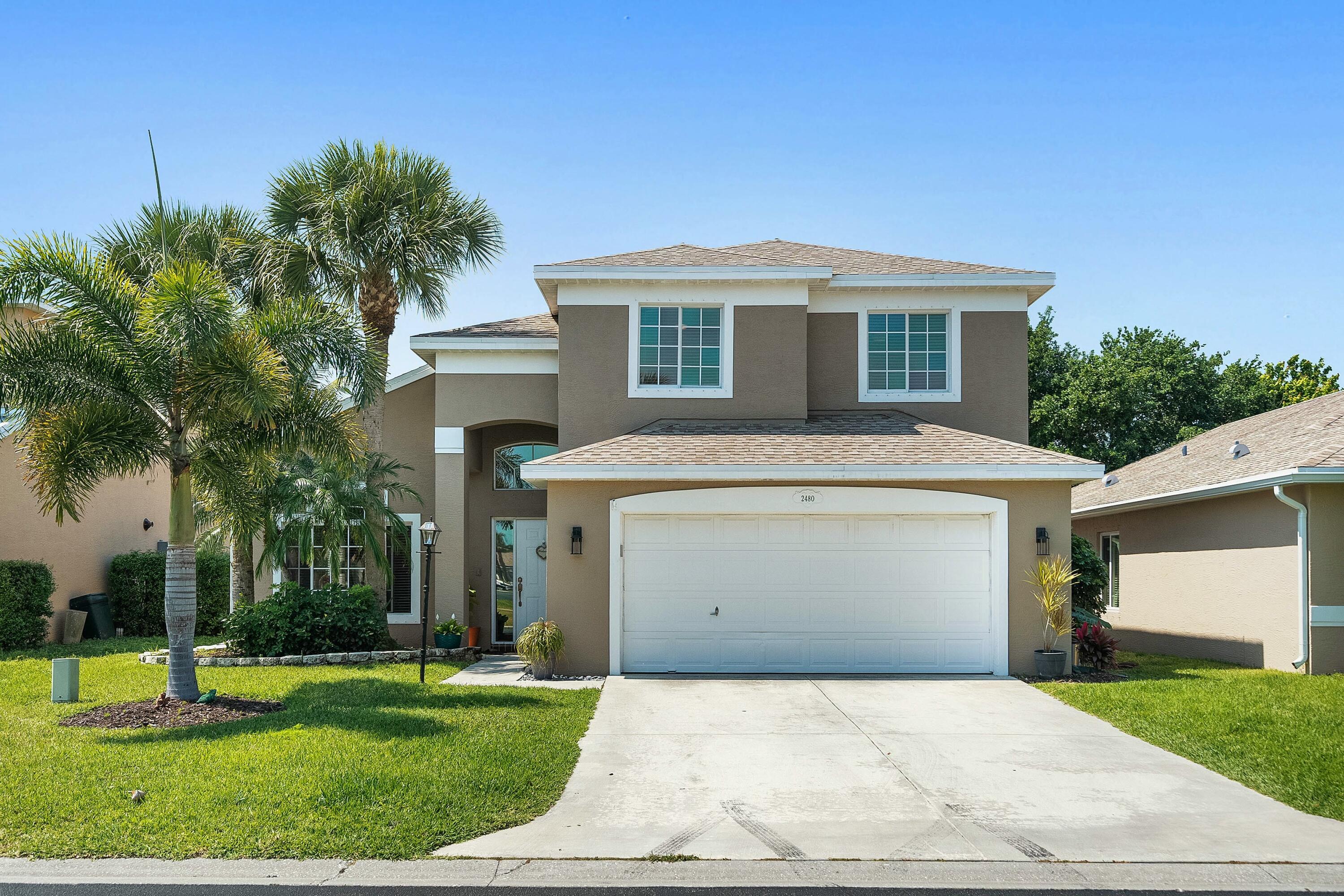 Gorgeous 4 bed 2.5 bath POOL home in desirable Springtree. Home boasts a 2022 Roof and updated kitchen with granite countertops, large island, and appliances. Brand new AC in 2020. The ground floor master suite includes a roman tub, walk-in shower, walk-in closet, and dual sinks. Large great room as you enter the home and a large open family room for plenty of entertaining space with a half bath. Upstairs has 3 beds with shared bathroom for the guests to have their own space. With the newer roof and screened-in pool this home is sure to impress. Rare find in Stuart and will not last. Gated community and friendly. Centrally located to great restaurants, shopping and the beautiful beaches.