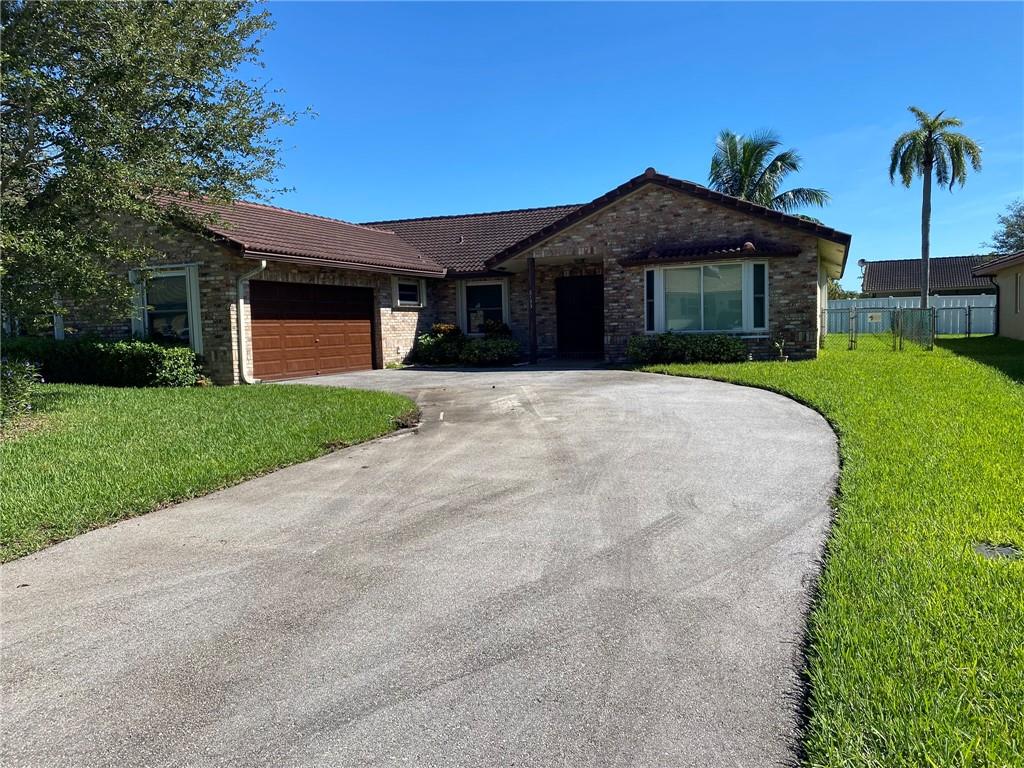 Find yourself in this Cypress Run fixer upper. Home has 3 bedroom with 2 full bathrooms. Kitchen flows nicely into family room. Beautiful pool area, newer AC, covered/screened patio area. Home has great potential!