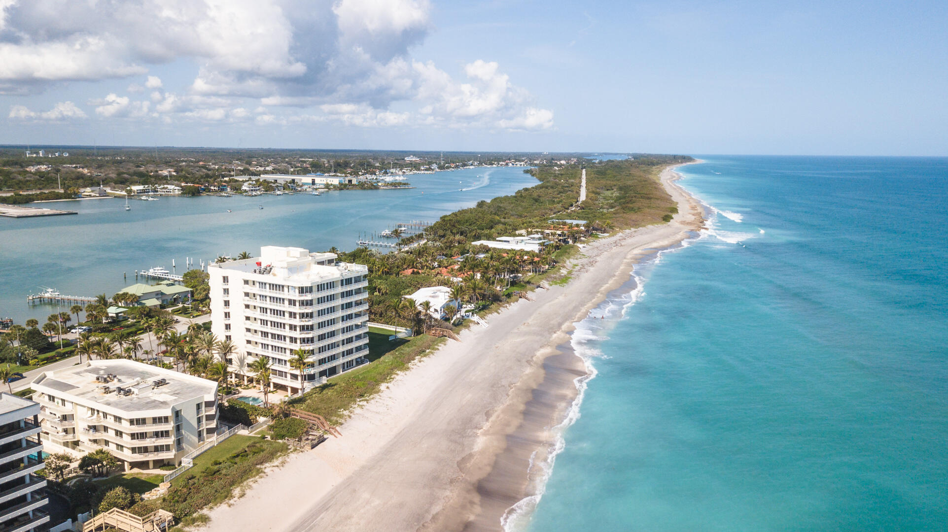 Welcome to paradise on the shores of Jupiter Island. The Claridge is an ultra-exclusive boutique residence with just 16 private estates. This full-service building offers 24-hour security, concierge service, and resort-like amenities, including a saltwater heated pool, gym with free weights and cardio equipment, saunas, boat docks, etc. This 4th-floor, south-facing residence has 3 bedrooms, 4.5-bathrooms w 3,500 sf of luxurious and spacious living with panoramic views of the Atlantic Ocean, the Intracoastal Waterway, and the historic Jupiter Lighthouse. Features include: 10' ceilings, limestone flooring, Poggenpohl cabinetry, Sub-Zero fridge, marble bathrooms, and a custom walk-in California closet. Also includes a climate-controlled, air-conditioned two-car garage. Wake up inspired!