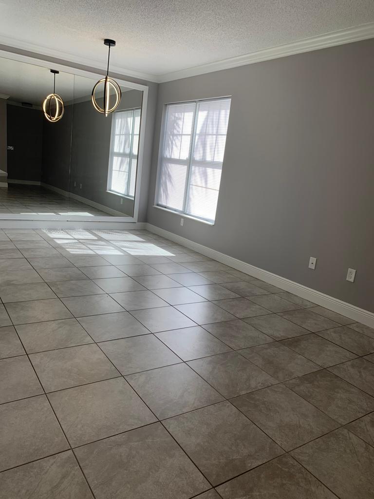 Rare opportunity! Minimum credit score of only 600 required. Beautifully remodeled 1st-floor corner unit featuring 2 bedrooms, 2 bathrooms, an attached garage, and 2 additional parking spaces in a gated community. Upgrades includes stainless steel appliances, quartz countertops, 2023 A/C, oversized baseboards throughout, and crown molding in the living room. Community amenities include a resort-style pool, fitness center, clubhouse, internet, water, and cable. Conveniently located within walking distance to shopping, dining, and major retailers, with easy access to the casino, highways, and entertainment. Move-in ready and available now!