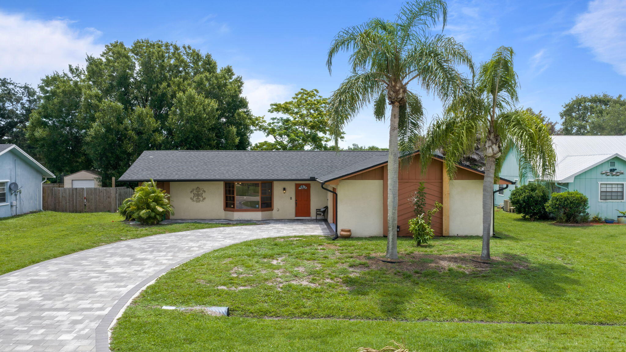 Beautifully maintained 3BR/2BA CBS home with a 2-car garage offering 1,726 living sq ft and a desirable split-bedroom floor plan. Recent updates include a 2022 roof, 2024 driveway, 2023 water heater, 2015 A/C, and a 2022 water filtration system on city water. The kitchen features stainless steel appliances, and the fully fenced backyard provides plenty of space for outdoor enjoyment. Energy-saving solar panels may be assumed by the new owner. Conveniently located near Jessica Clinton Park, the Floresta area, I-95, shopping, dining, and everyday conveniences. Move-in ready !