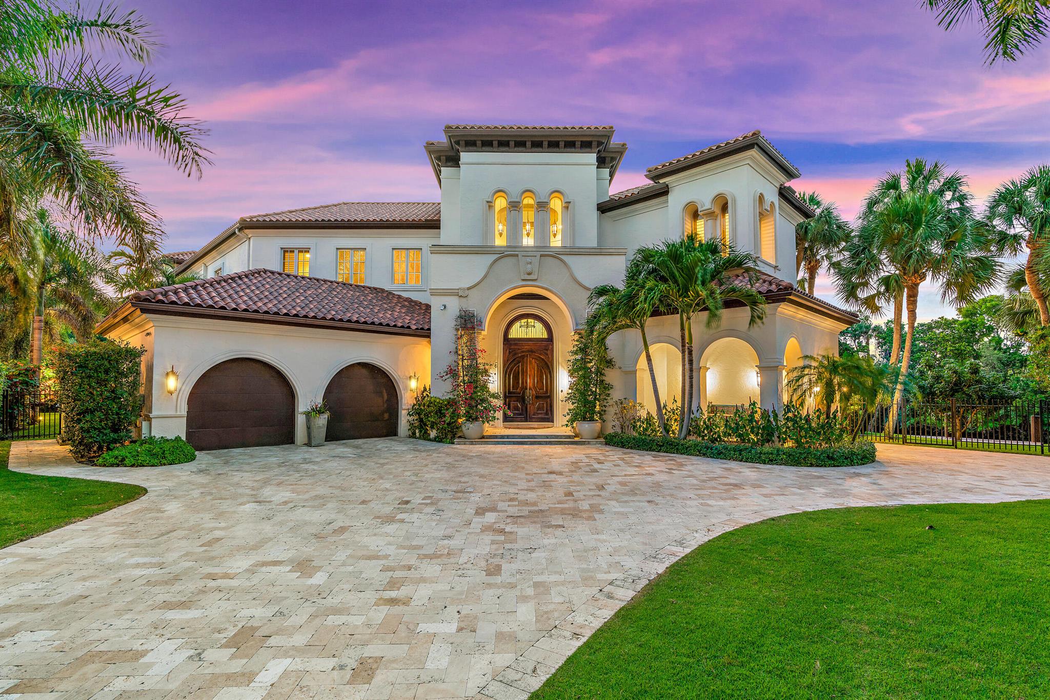 Harbour Isles most prestigious & private waterfront estate is available!
Enjoy the true essence of waterfront living in this exclusive & grand residence in the highly desirable gated community of Harbour Isles. A boaters dream with over 250ft of water frontage, deep dockage & private preserve views. This unique 5 BD, 7 BA, custom residence features over 10,000 TSF, refined office, home gym, entertainment area, family room, formal living & dining room situated on an oversized lot with TWO ample side yards! Entertain with ease with the spacious outdoor patio, oversized pool & spa area complete with summer kitchen.
Upon entering the property, you are greeted with soaring ceilings & stunning water views. The perfect home for your large vessels & waterfront views from virtually every angle! This rare gem is the perfect combination of charm & warmth. Sit in the custom kitchen and enjoy a cup of coffee while speaking about your day from the casual breakfast nook.  Work from home with ease as this well designed floor plan provides private & classic office space. Impeccable attention to detail throughout including a new home generator, air purification, upgraded HVACS and top of the line appliances.
Enjoy the calming intracoastal waters while relaxing on one of many balconies. One of the largest entrances in Harbour Isles with extra parking for guests. This ultra luxury home is truly one of the most well constructed & dynamic properties in Palm Beach County. Don't miss out call for your private showing today!