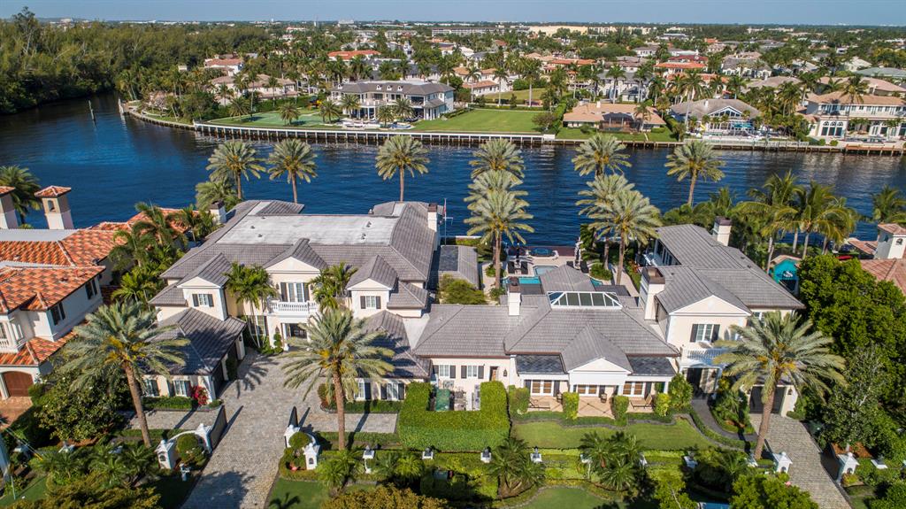 Gated and walled Palm Beach-inspired Georgian Intracoastal Estate sited on 2 lots with 200 ± feet of waterfrontage overlooking an      expansive view of the ICWW.

Lavish entertaining is set in the center Party Pavilion (Great Room 37 x 26) with professional bar, soaring fireplace and large window wall of sliders that open to the pool/patio.

Resort-style pool/patio with spa,fountain, boat lift and expansive landscaped grounds for entertaining.  Shown By Appointment Only. DISCLAIMER: The written and verbal information provided including but not limited to prices, measurements, square footages, lot sizes, calculations and statistics have been obtained and conveyed from third parties such as the applicable Multiple Listing Service, public records as well as other sources. All information including that produced by the Sellers or Listing Company are subject to errors, omissions or changes without notice and should be independently verified by any prospect for the purchase of a Property.  The Sellers and Listing Company expressly disclaim any warranty or representation regarding all information.  Prospective purchasers' use of this or any written and verbal information is acknowledgement of this disclaimer and that Prospects shall perform their own due diligence.  Prospective purchasers shall not rely on any written or verbal information provided when entering a contract for sale and purchase.  Some affiliations may not be applicable to certain geographic areas. If your property is currently listed with another agent, please do not consider this a solicitation for the listing. In the event a Buyer defaults, no commission will be paid to either Broker on the Deposits retained by the Seller.  "No Commissions Paid until Title Passes."  Copyright 2019 Listing Company. All Rights Reserved.