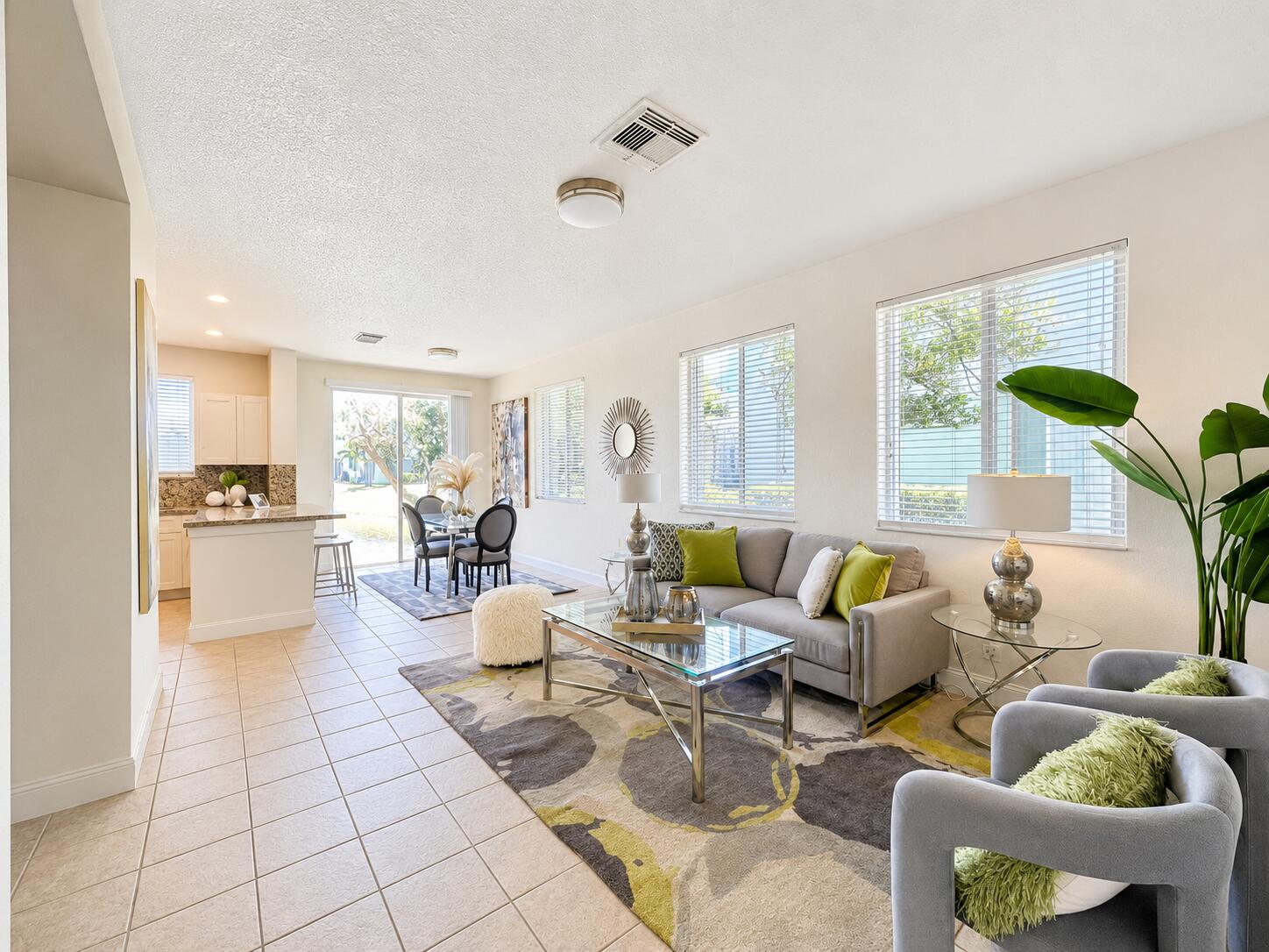 Welcome to this beautifully maintained waterfront 2-story townhome located in the gated resort-style community of Thousand Oaks in Riviera Beach. This spacious residence features two oversized primary ensuite bedrooms, each offering privacy and comfort, along with an additional half bath conveniently located on the main level.  Enjoy peaceful waterfront views from your home while benefiting from desirable upgrades including accordion shutters on all windows, in-unit washer and dryer, and an attached 1-car garage. The bright and functional layout offers comfortable living spaces ideal for both full-time residents and seasonal homeowners.  Residents of Thousand Oaks enjoy resort-style amenities including a swimming pool, kiddie splash area, fitness center, tennis courts, basketball & more. Association Rules, Purchase Application listed.